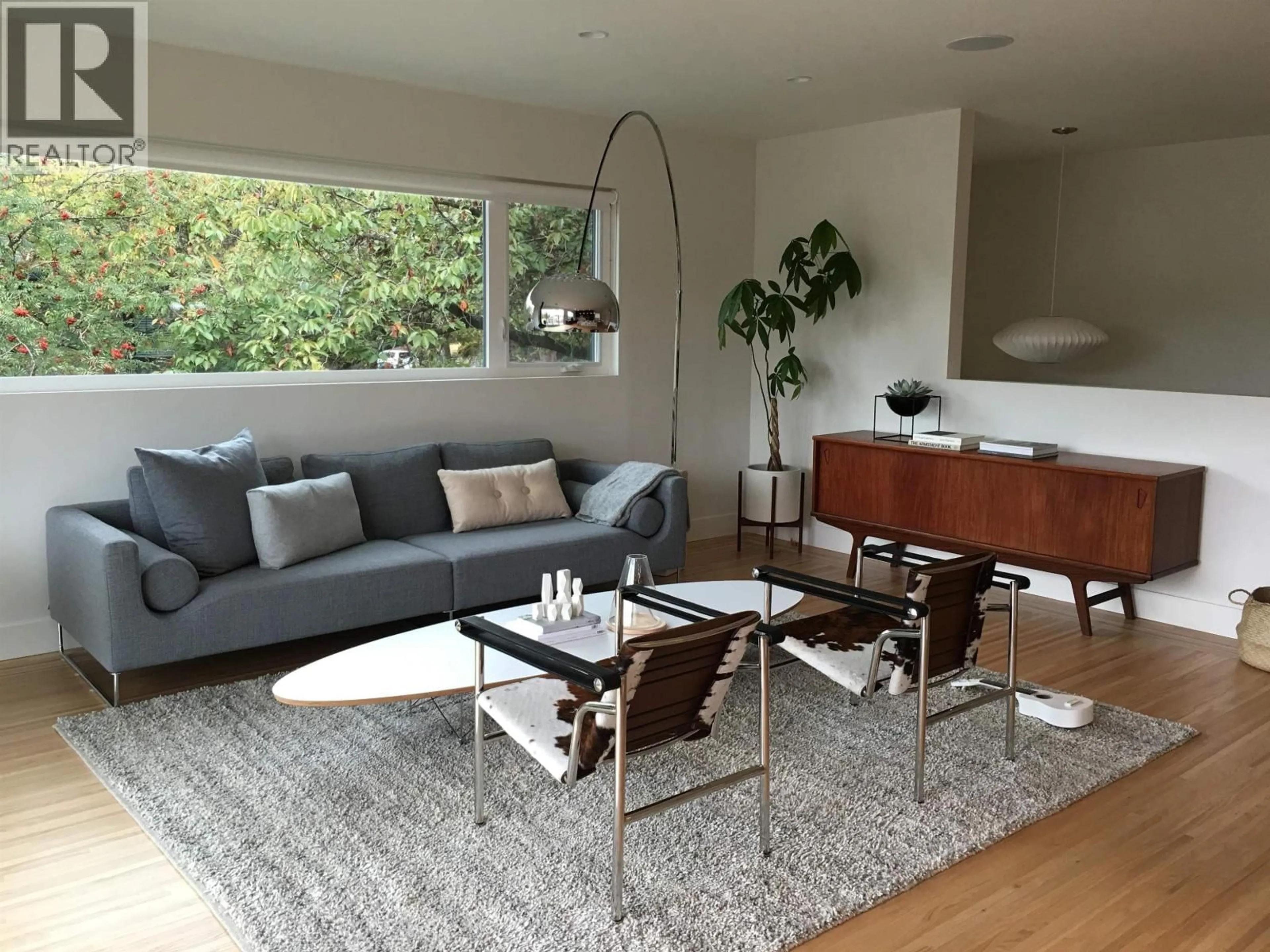 Living room with furniture, wood/laminate floor for 8330 ADERA STREET, Vancouver British Columbia V6P5E5
