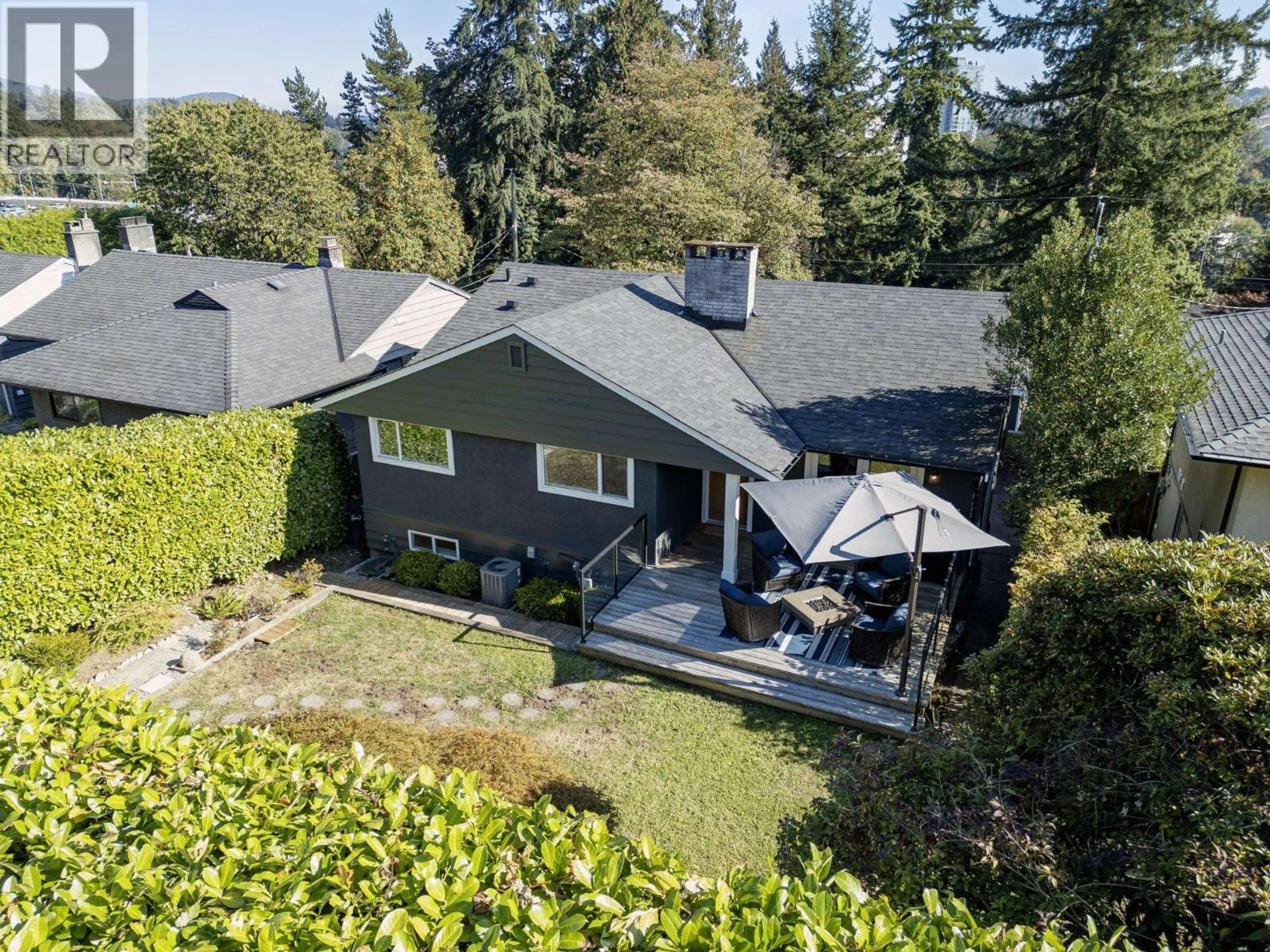 A pic from outside/outdoor area/front of a property/back of a property/a pic from drone, street for 1243 CLOVERLEY STREET, North Vancouver British Columbia V7L1N7