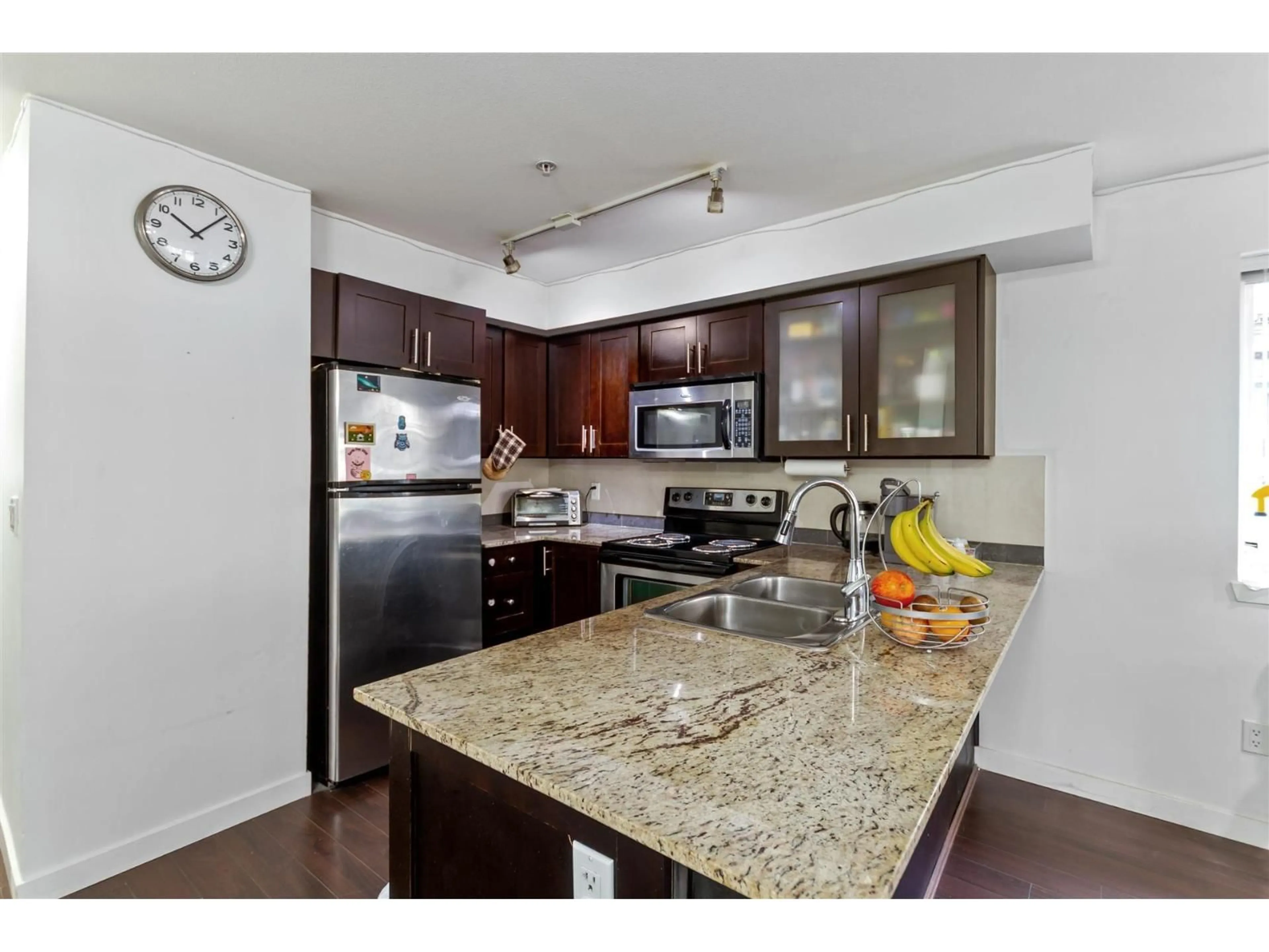 Open concept kitchen, unknown for 124 - 13958 108 AVENUE, Surrey British Columbia V3T0B4