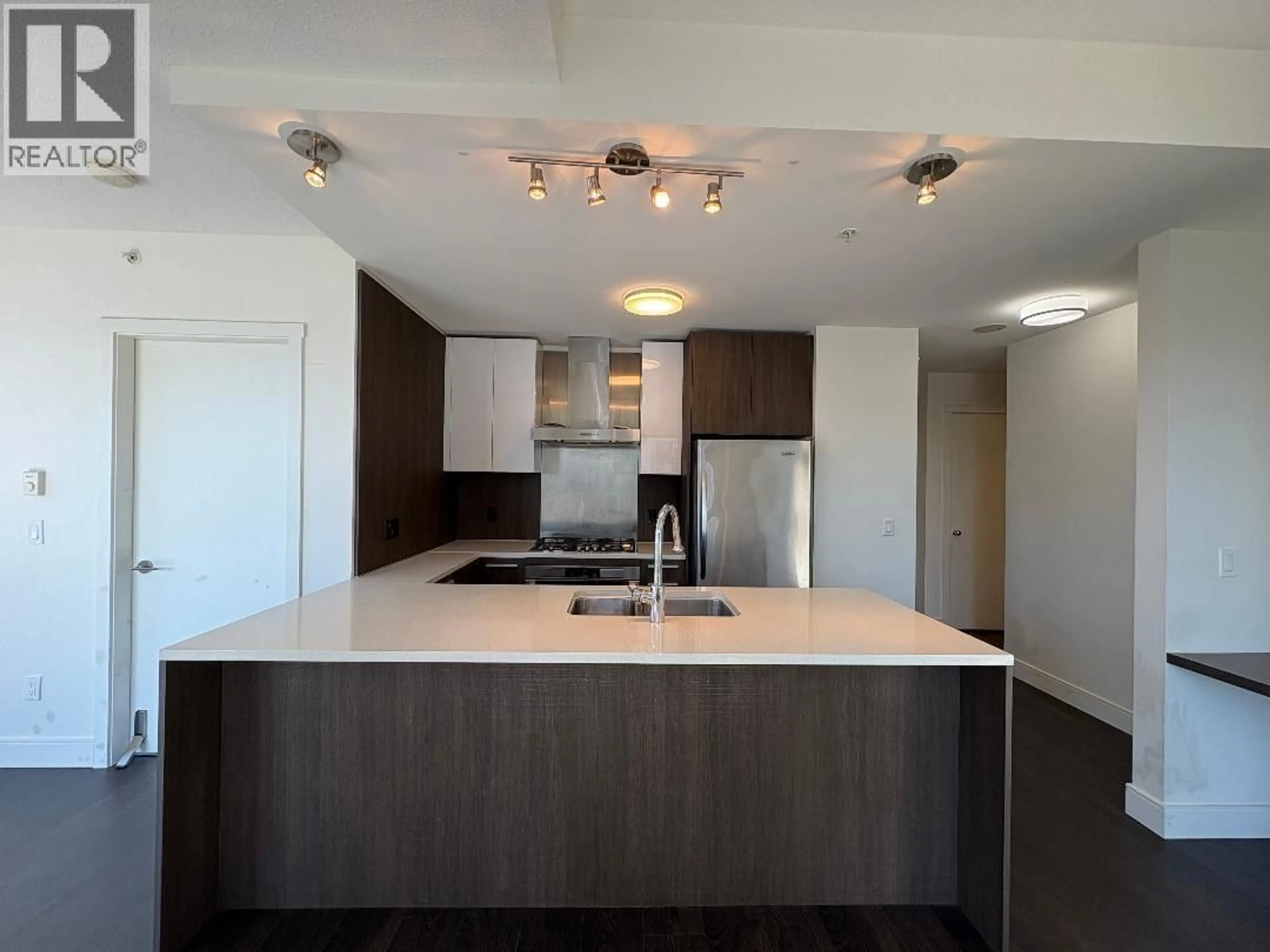 Open concept kitchen, wood/laminate floor for 2806 - 3007 GLEN DRIVE, Coquitlam British Columbia V3B0L8