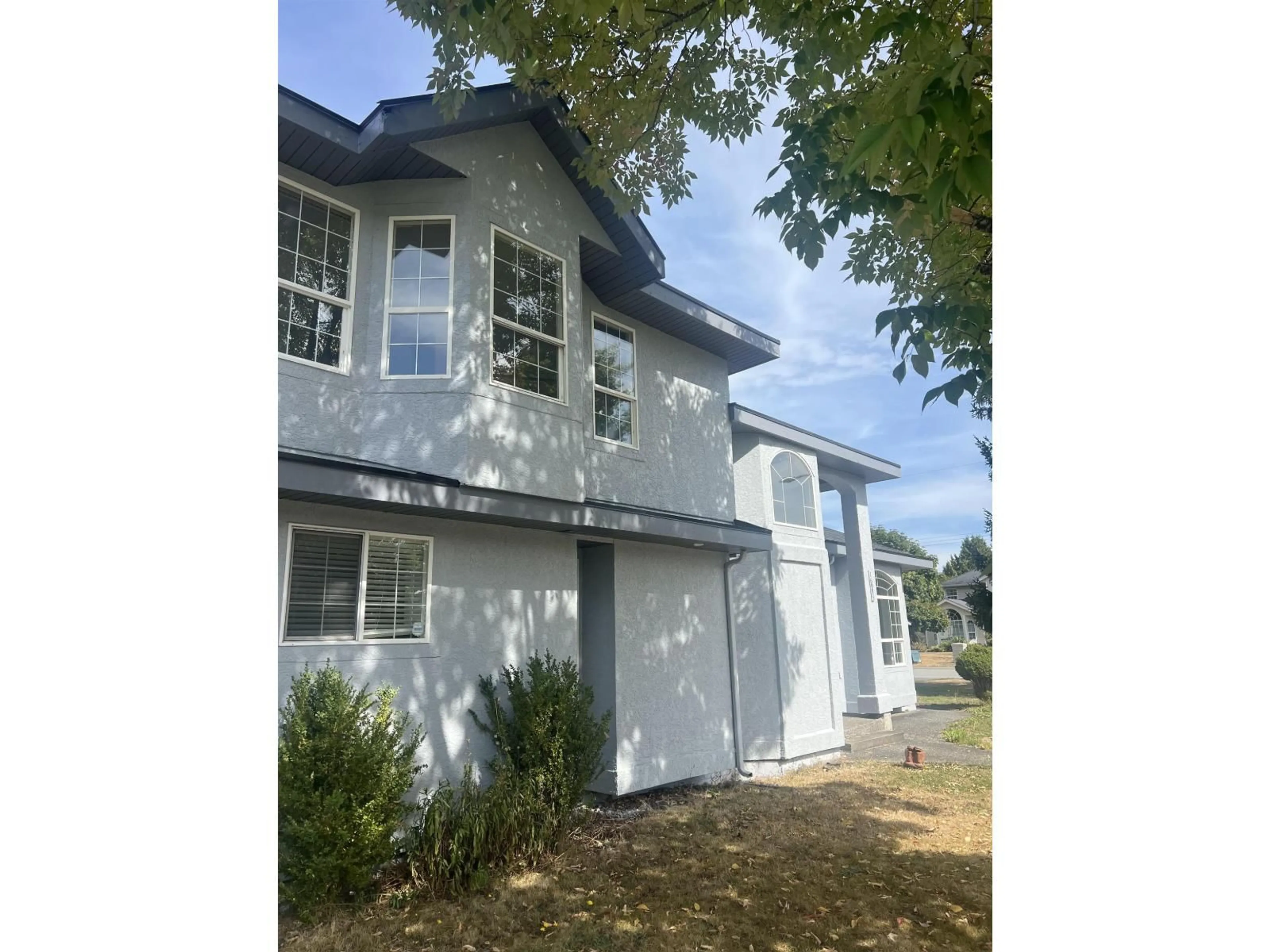 Home with vinyl exterior material, street for 16985 61 AVENUE, Surrey British Columbia V3S8X6