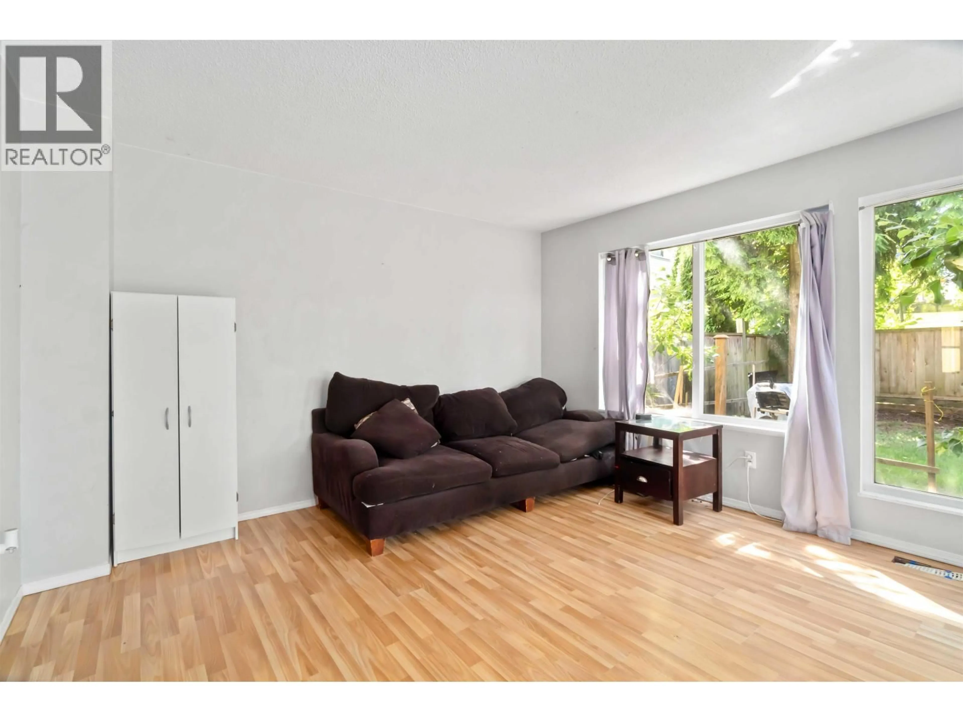 Living room with furniture, wood/laminate floor for 881 PINEBROOK PLACE, Coquitlam British Columbia V3C4C1