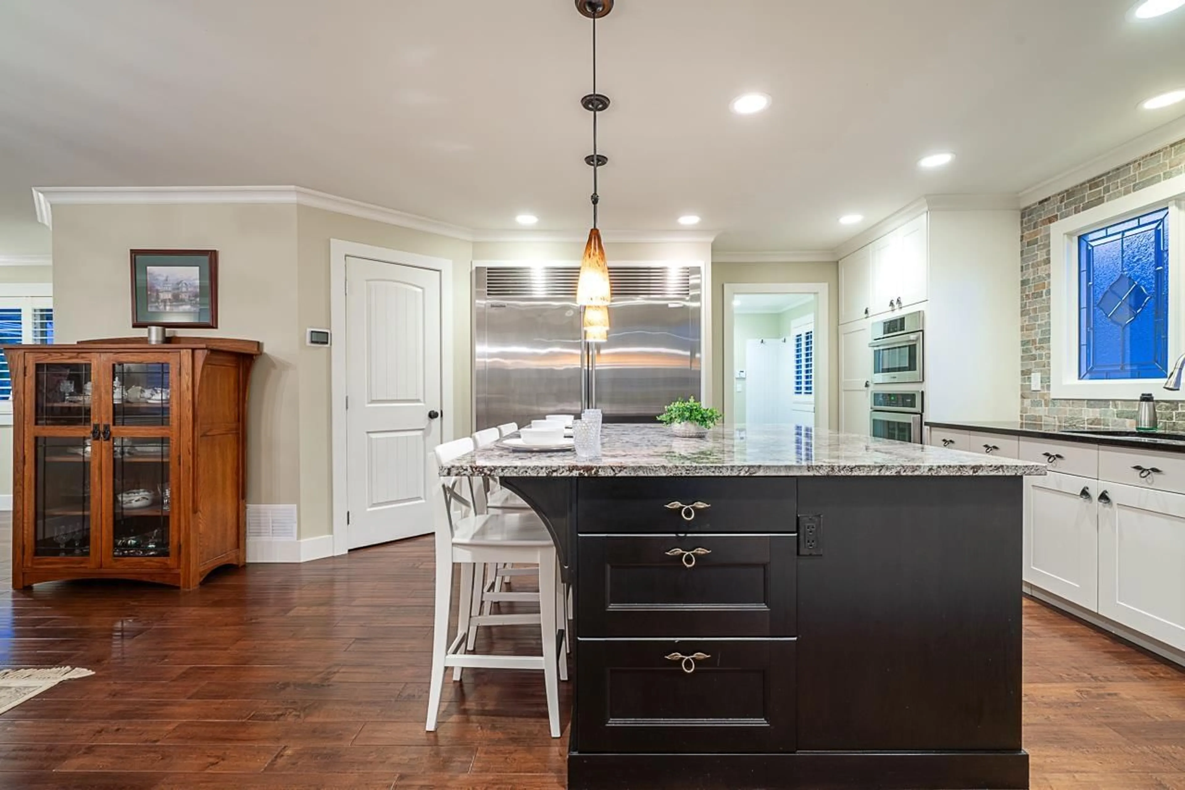 Open concept kitchen, wood/laminate floor for 26973 33 AVENUE, Langley British Columbia V4W3G5
