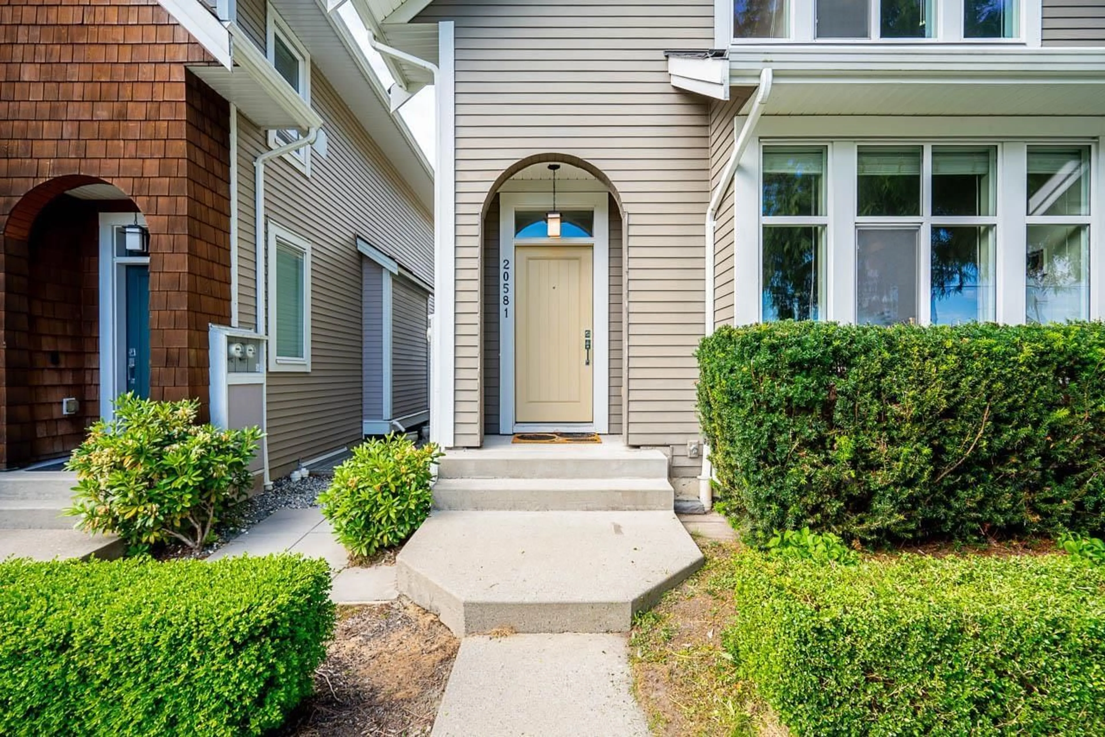 Home with vinyl exterior material, street for 20581 84 AVENUE, Langley British Columbia V2Y0P4