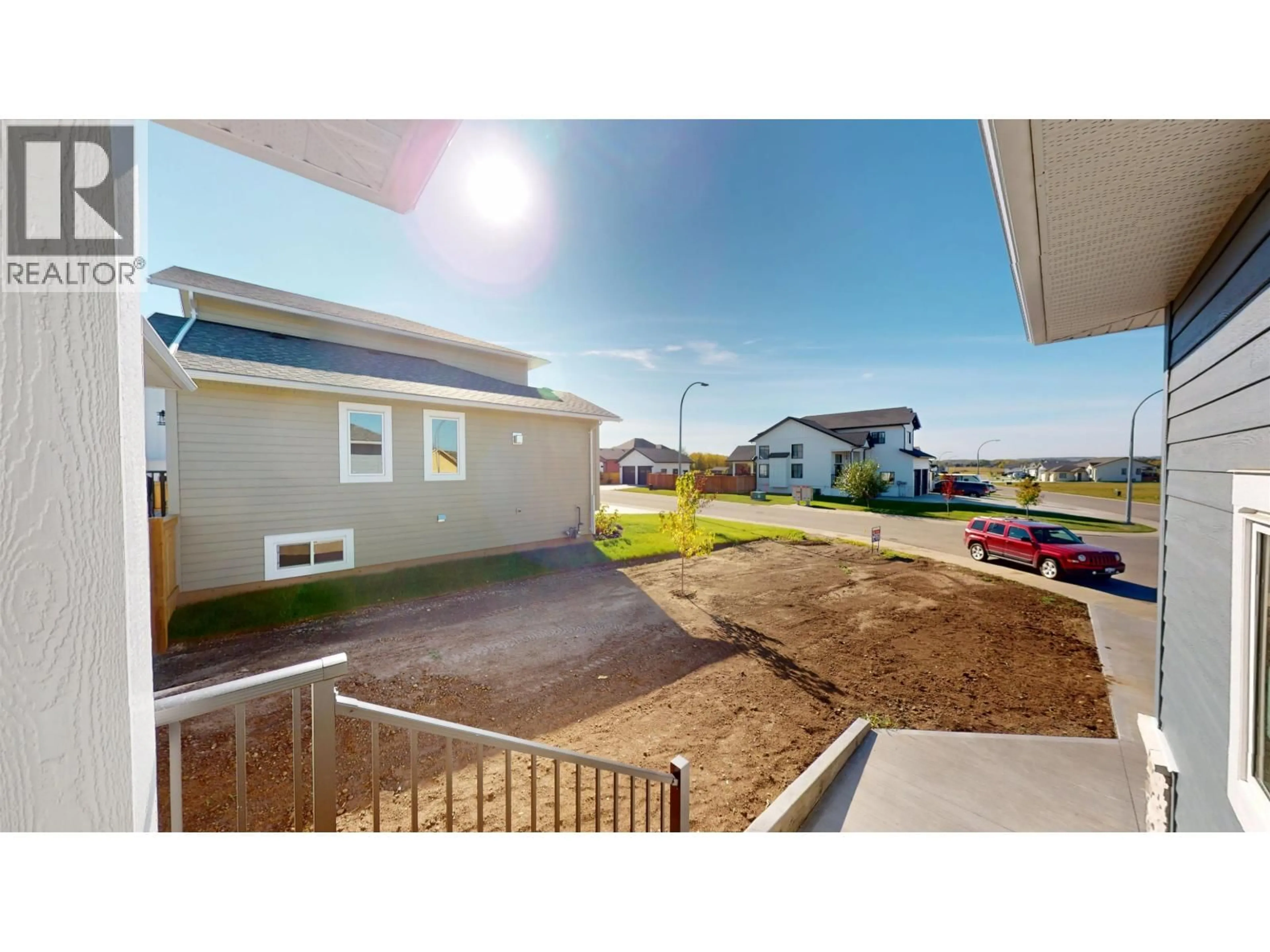A pic from outside/outdoor area/front of a property/back of a property/a pic from drone, unknown for 11119 110 STREET, Fort St. John British Columbia V1J0R6