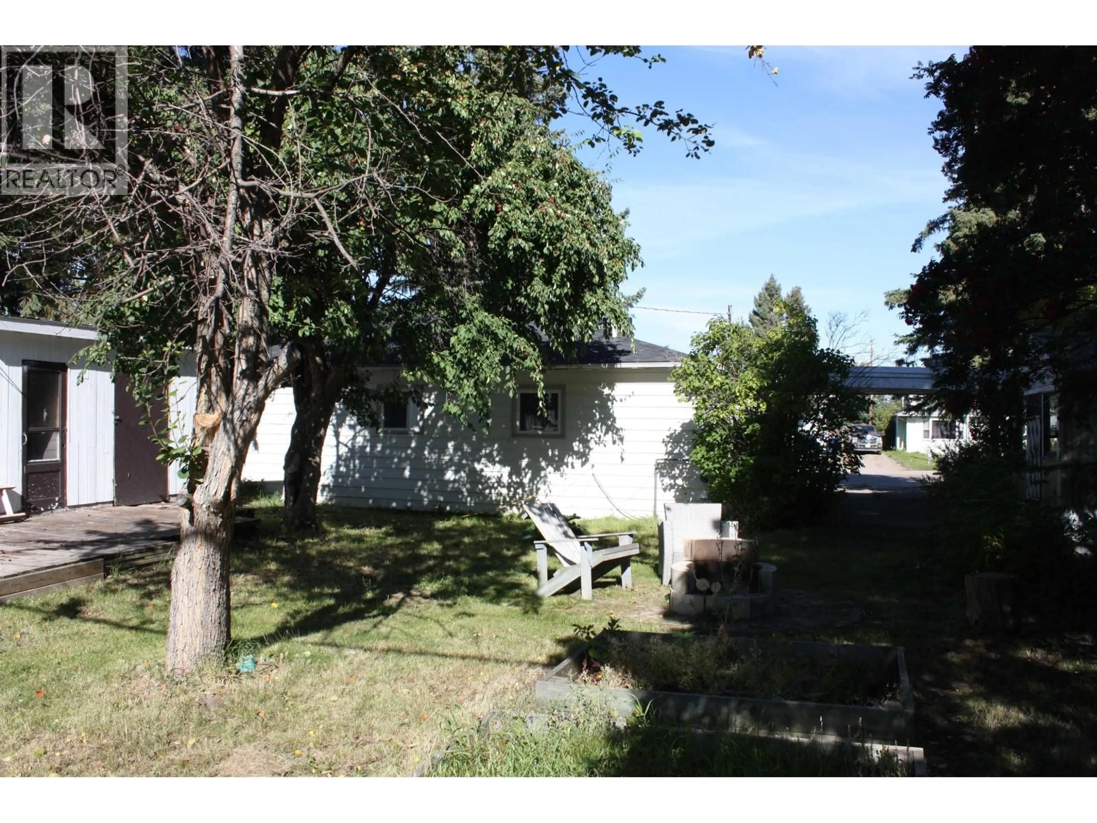 A pic from outside/outdoor area/front of a property/back of a property/a pic from drone, water/lake/river/ocean view for 9123 116 AVENUE, Fort St. John British Columbia V1J2Y3