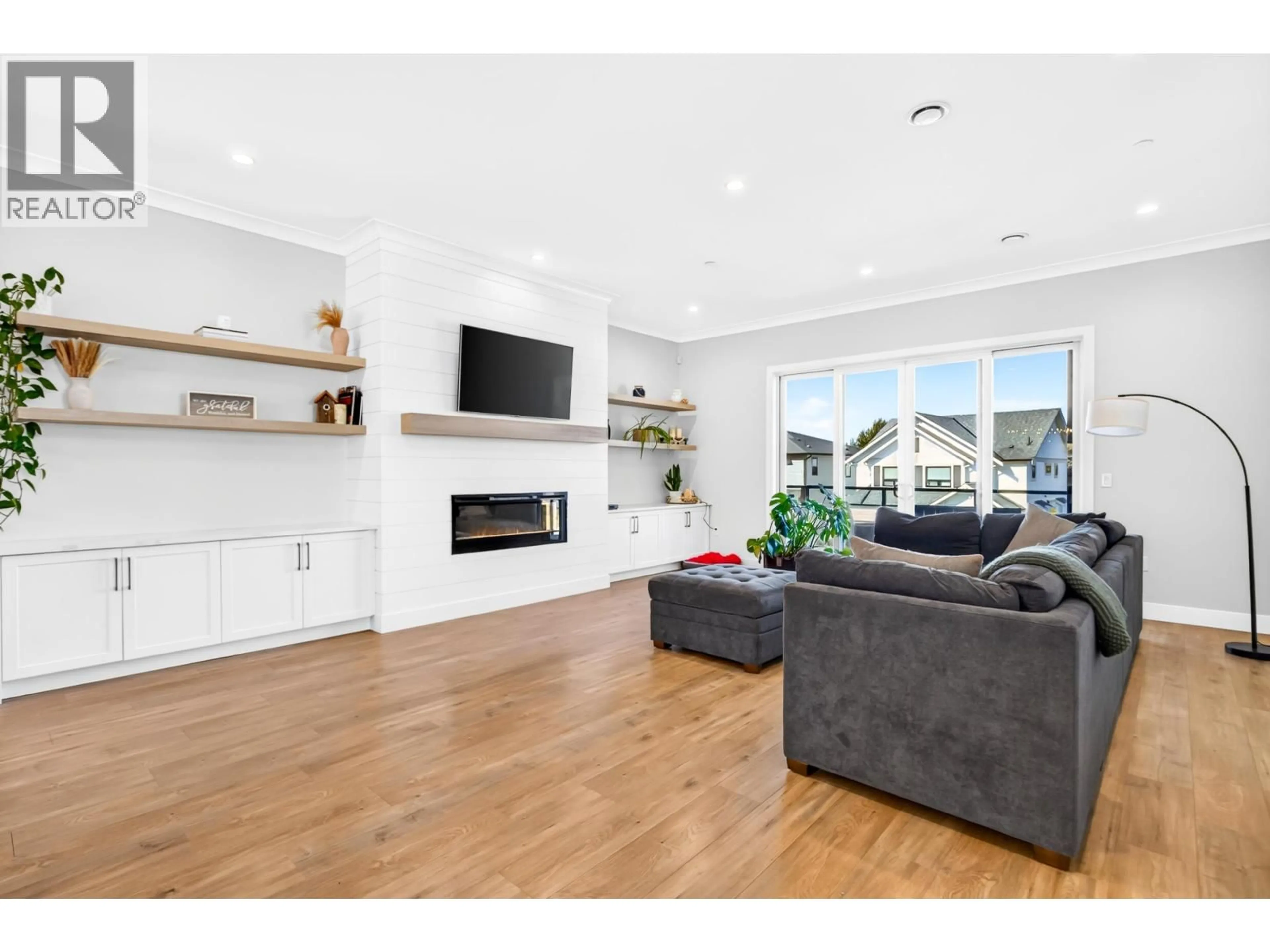 Living room with furniture, wood/laminate floor for 10596 MCVEETY STREET, Maple Ridge British Columbia V2W0K3
