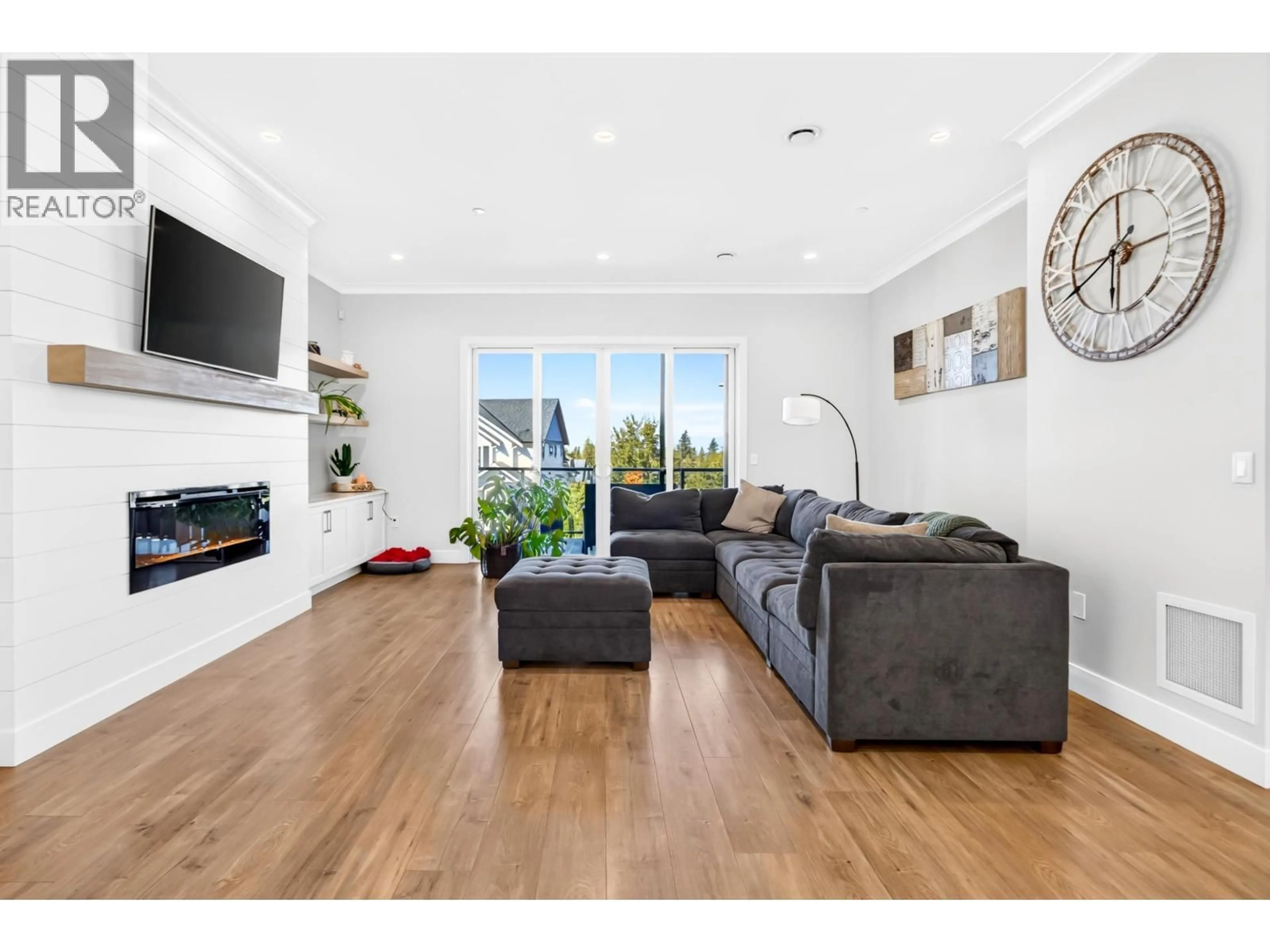 Living room with furniture, wood/laminate floor for 10596 MCVEETY STREET, Maple Ridge British Columbia V2W0K3