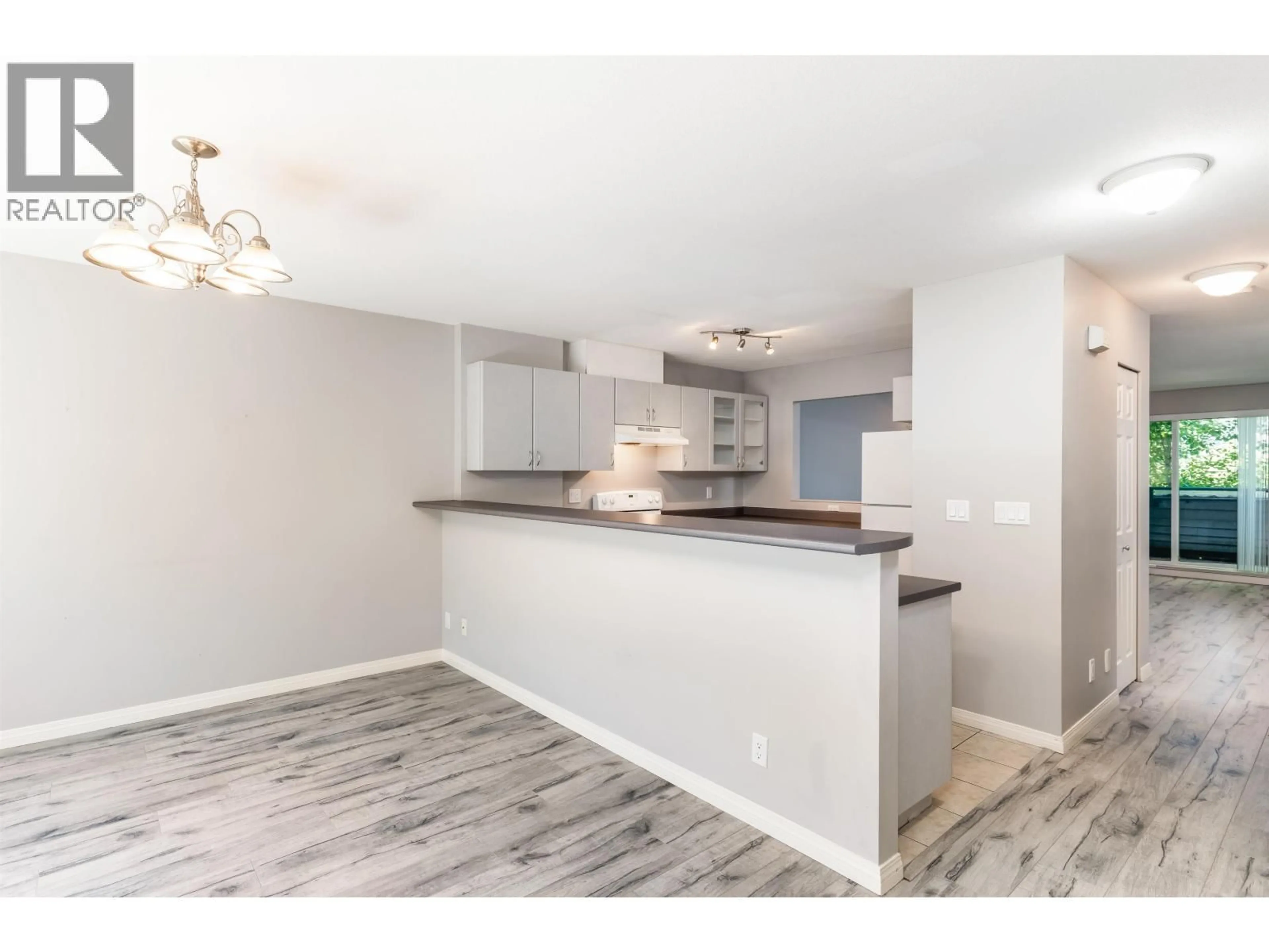 Open concept kitchen, wood/laminate floor for 132 SHORELINE CIRCLE, Port Moody British Columbia V3H5B3