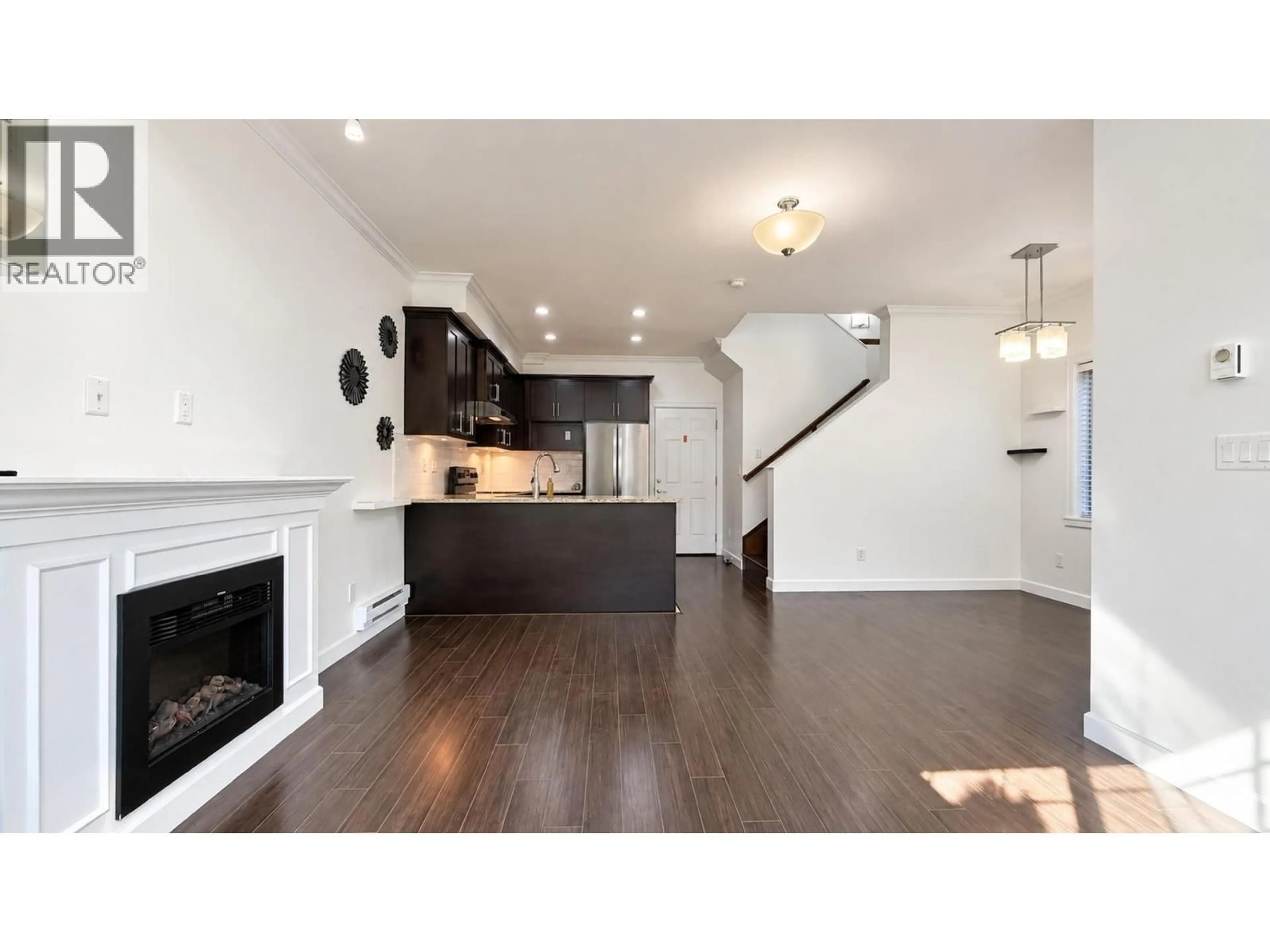 Open concept kitchen, wood/laminate floor for 2 - 8531 WILLAMS ROAD, Richmond British Columbia V7A1G7