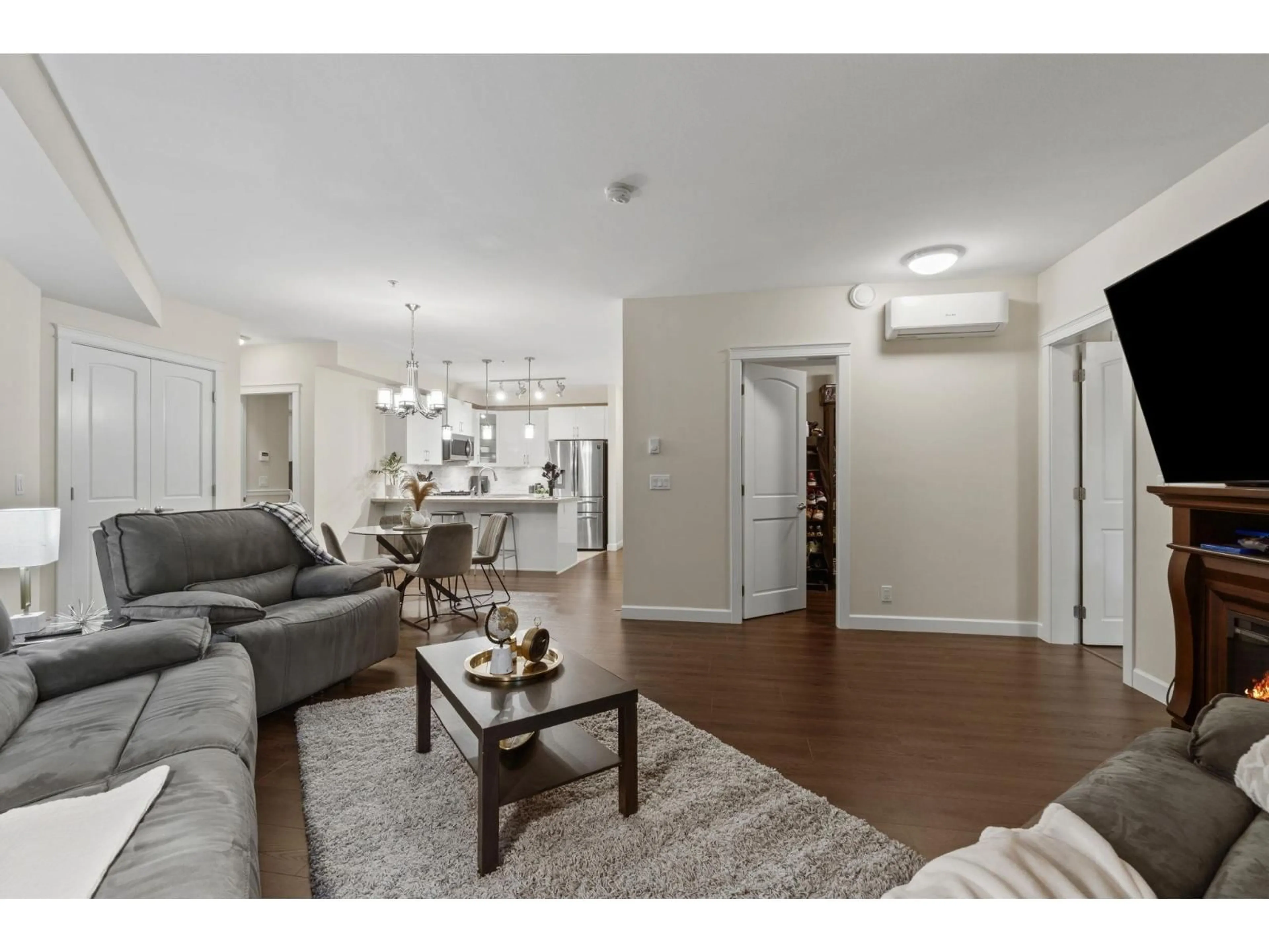 Living room with furniture, wood/laminate floor for 20376 86 AVENUE, Langley British Columbia V2Y3P8