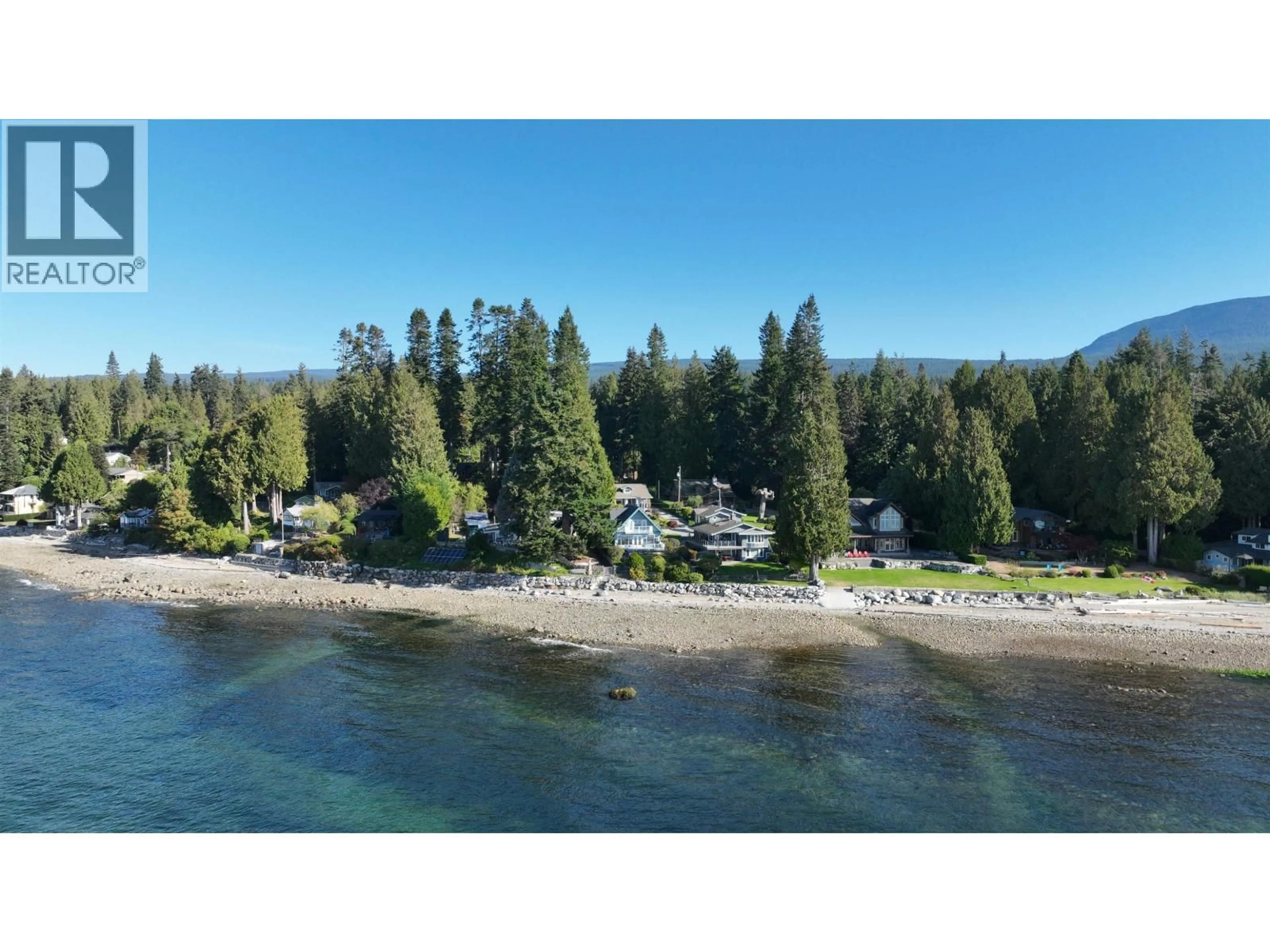 A pic from outside/outdoor area/front of a property/back of a property/a pic from drone, water/lake/river/ocean view for 3199 BEACH AVENUE, Roberts Creek British Columbia V0N2W0