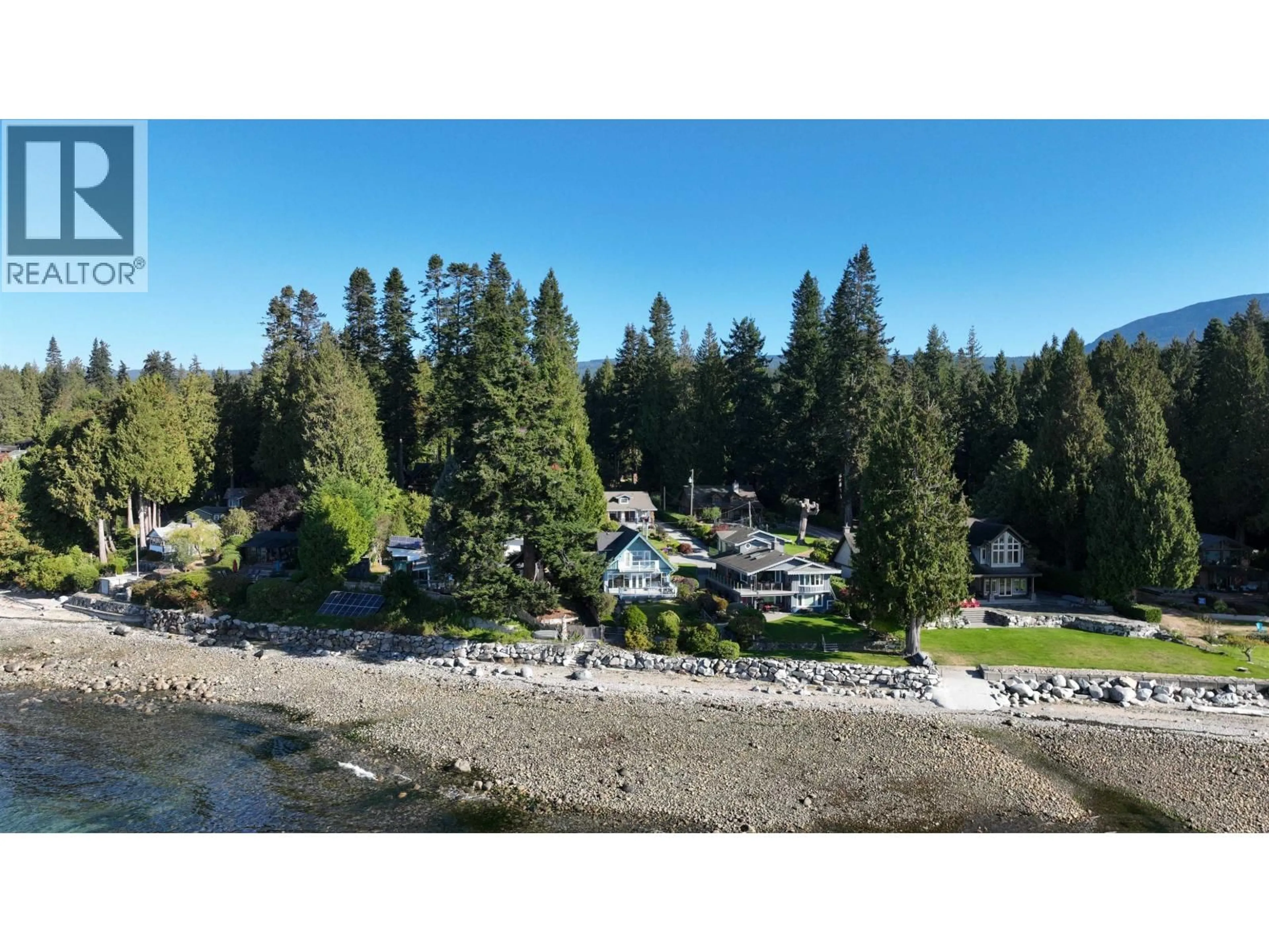 A pic from outside/outdoor area/front of a property/back of a property/a pic from drone, water/lake/river/ocean view for 3199 BEACH AVENUE, Roberts Creek British Columbia V0N2W0