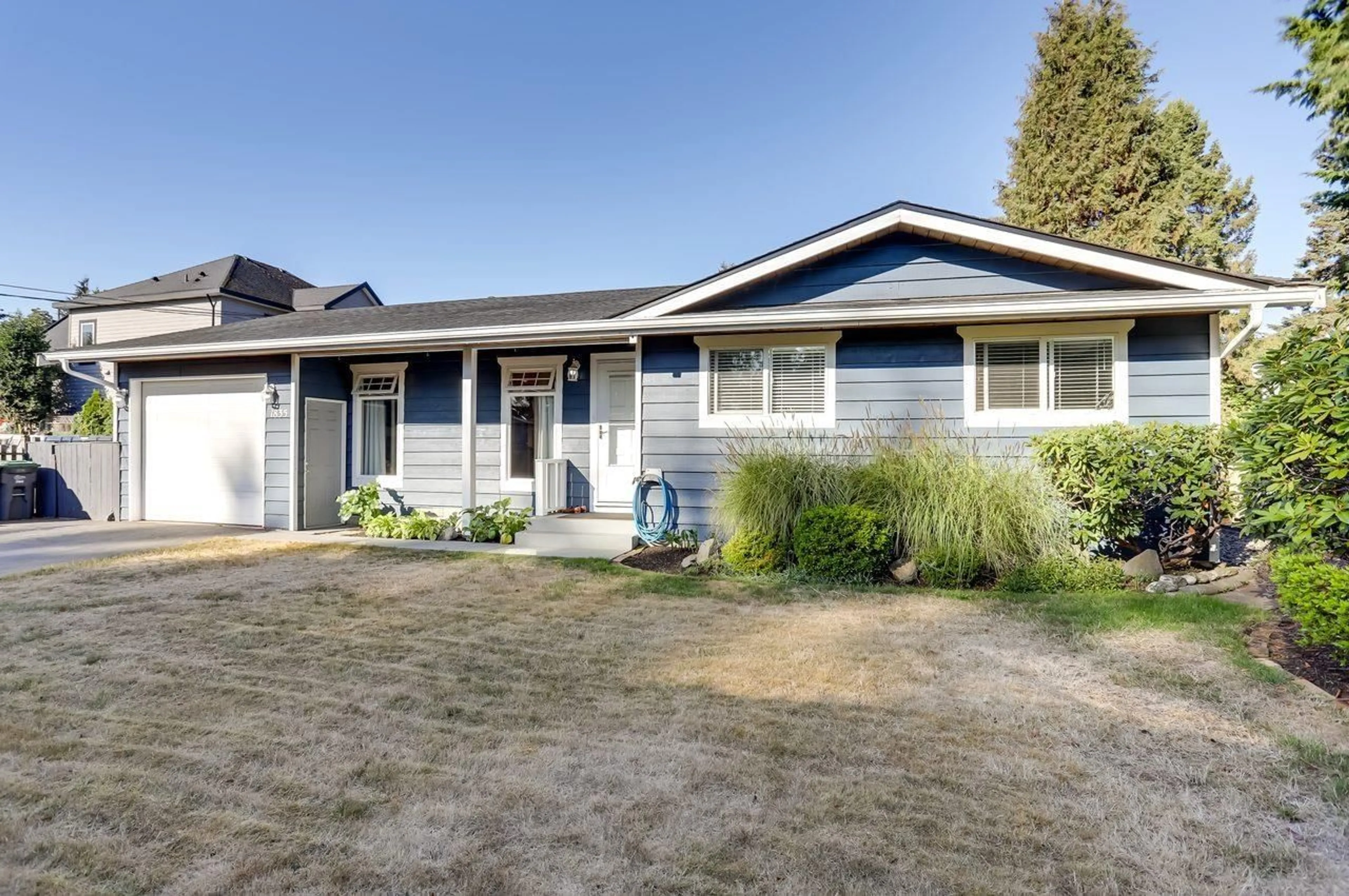 Home with vinyl exterior material, street for 1835 156 STREET, Surrey British Columbia V4A4T5