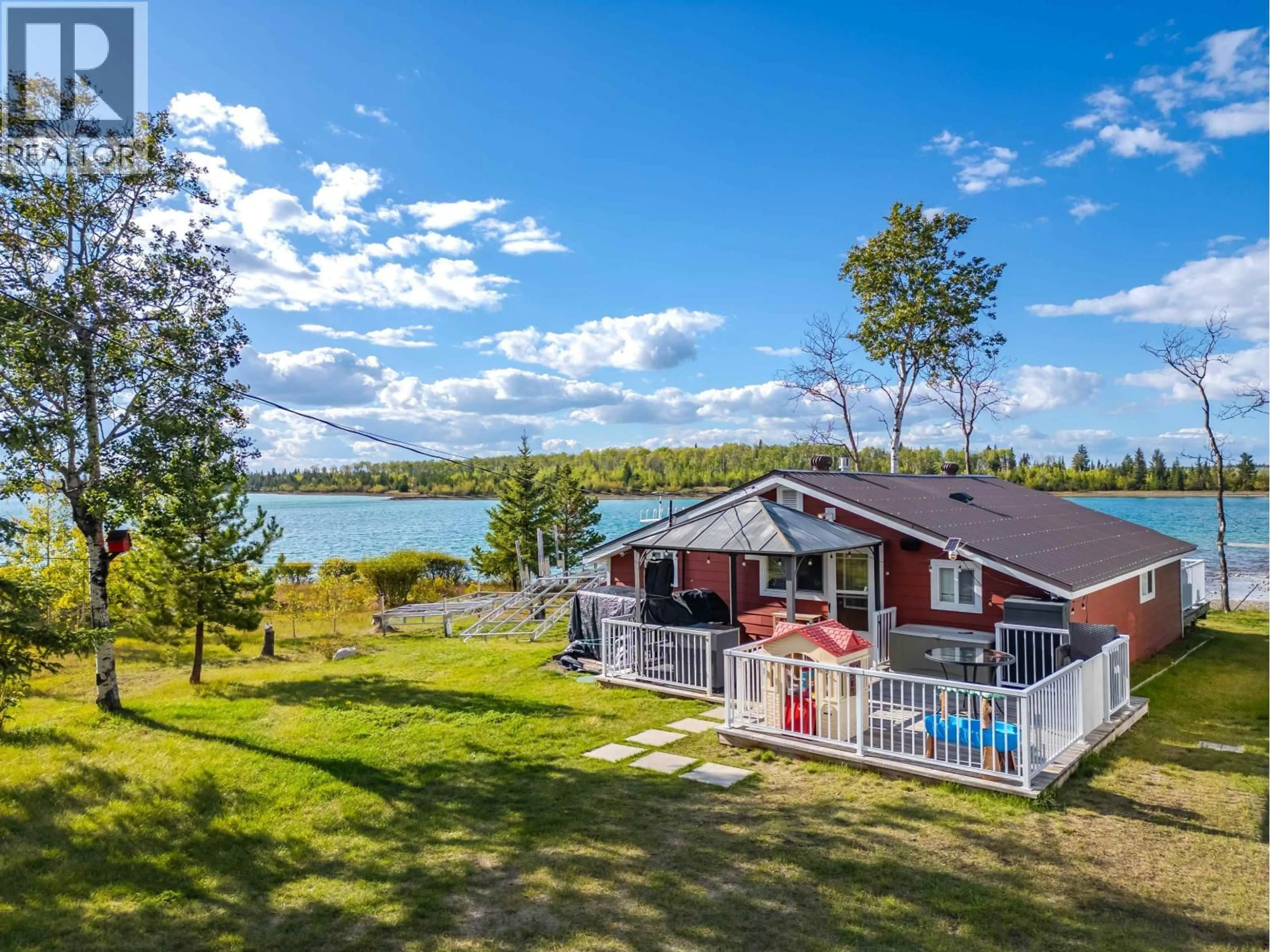 A pic from outside/outdoor area/front of a property/back of a property/a pic from drone, water/lake/river/ocean view for 131 SOUTH CREST ROAD, Green Lake British Columbia V0K2K2