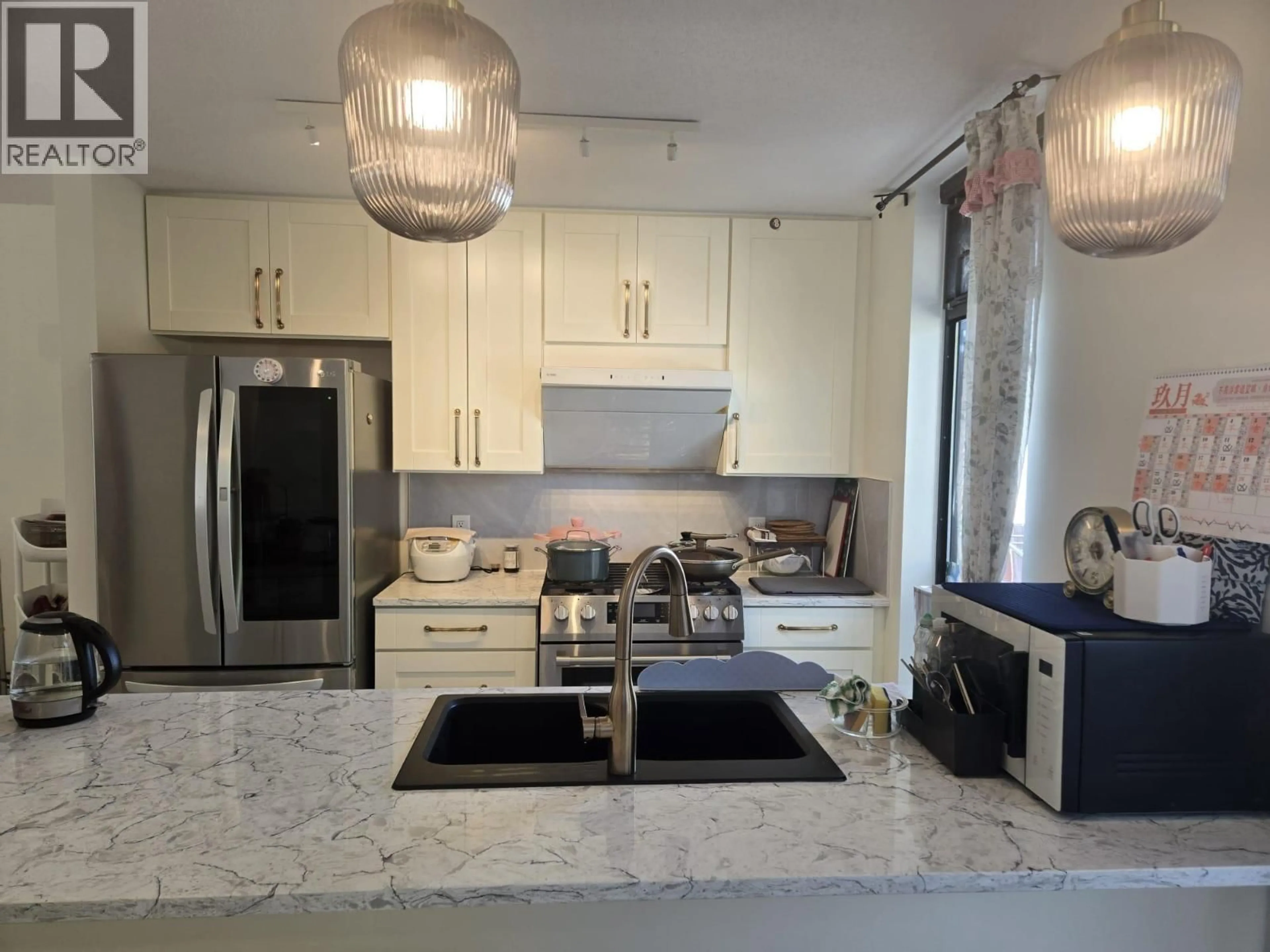 Open concept kitchen, ceramic/tile floor for 1 - 7911 ACKROYD ROAD, Richmond British Columbia V6X4L6