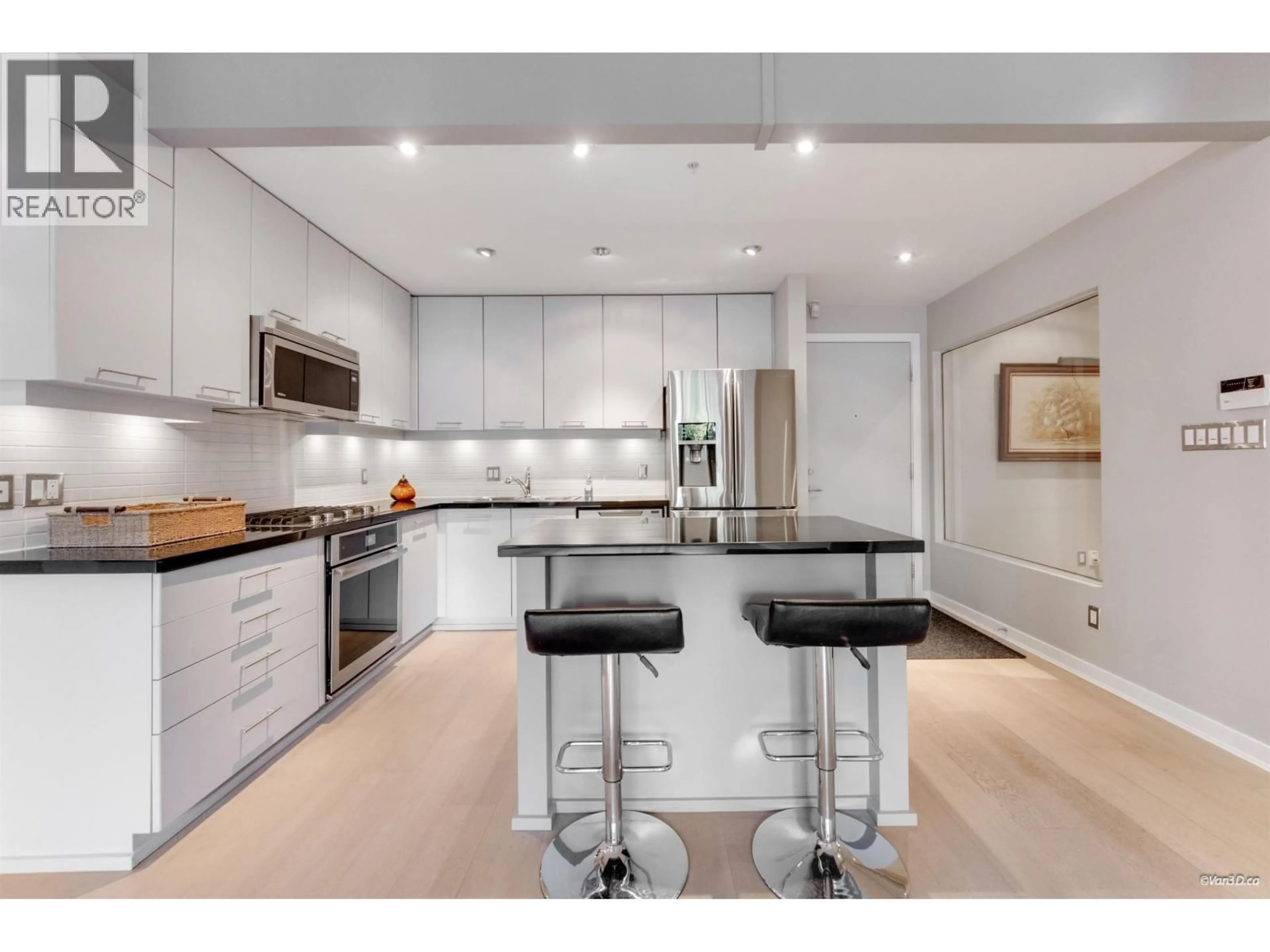 Open concept kitchen, unknown for 210 - 530 RAVEN WOODS DRIVE, North Vancouver British Columbia V7G2T5
