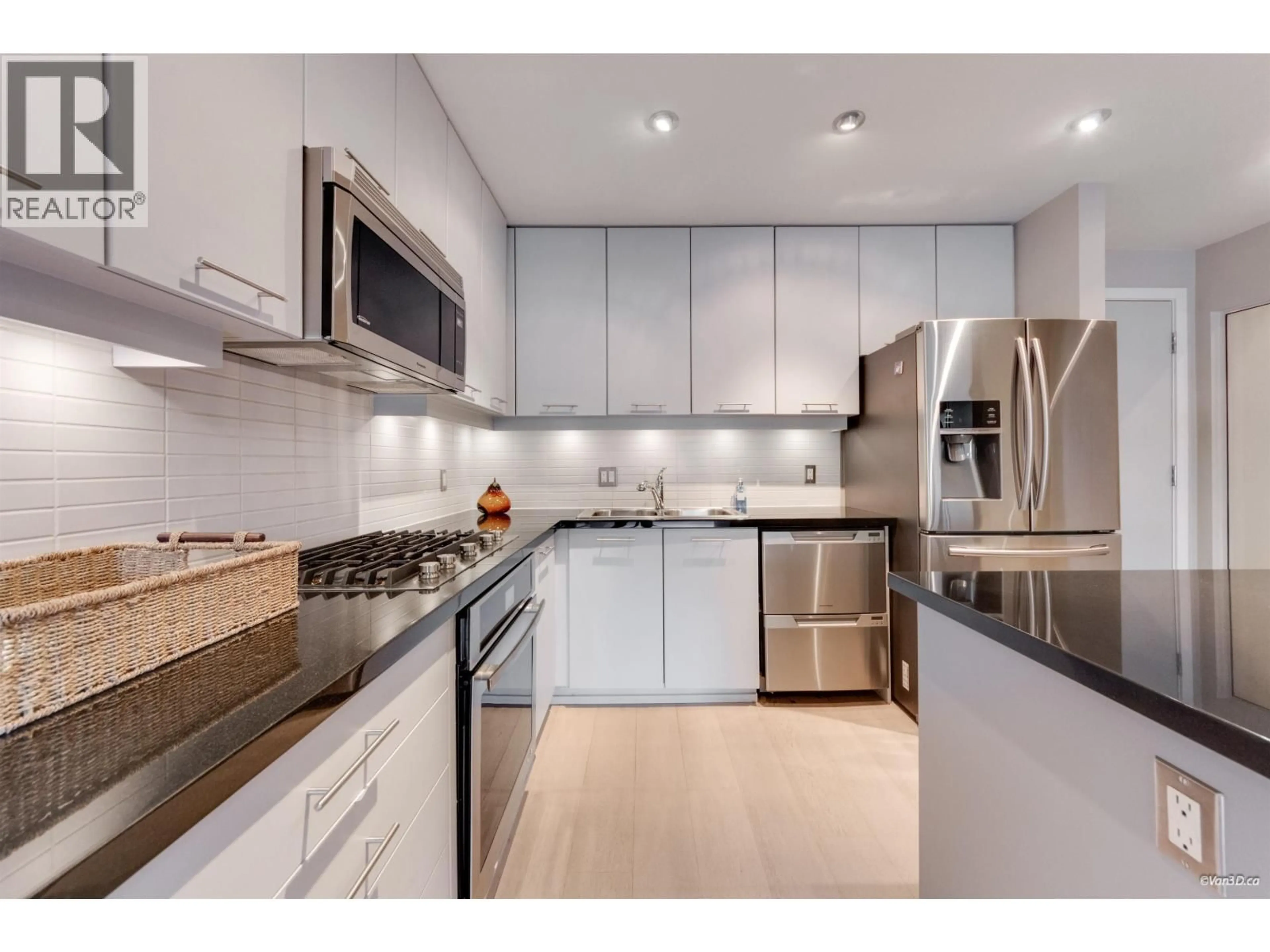 Contemporary kitchen, ceramic/tile floor for 210 - 530 RAVEN WOODS DRIVE, North Vancouver British Columbia V7G2T5