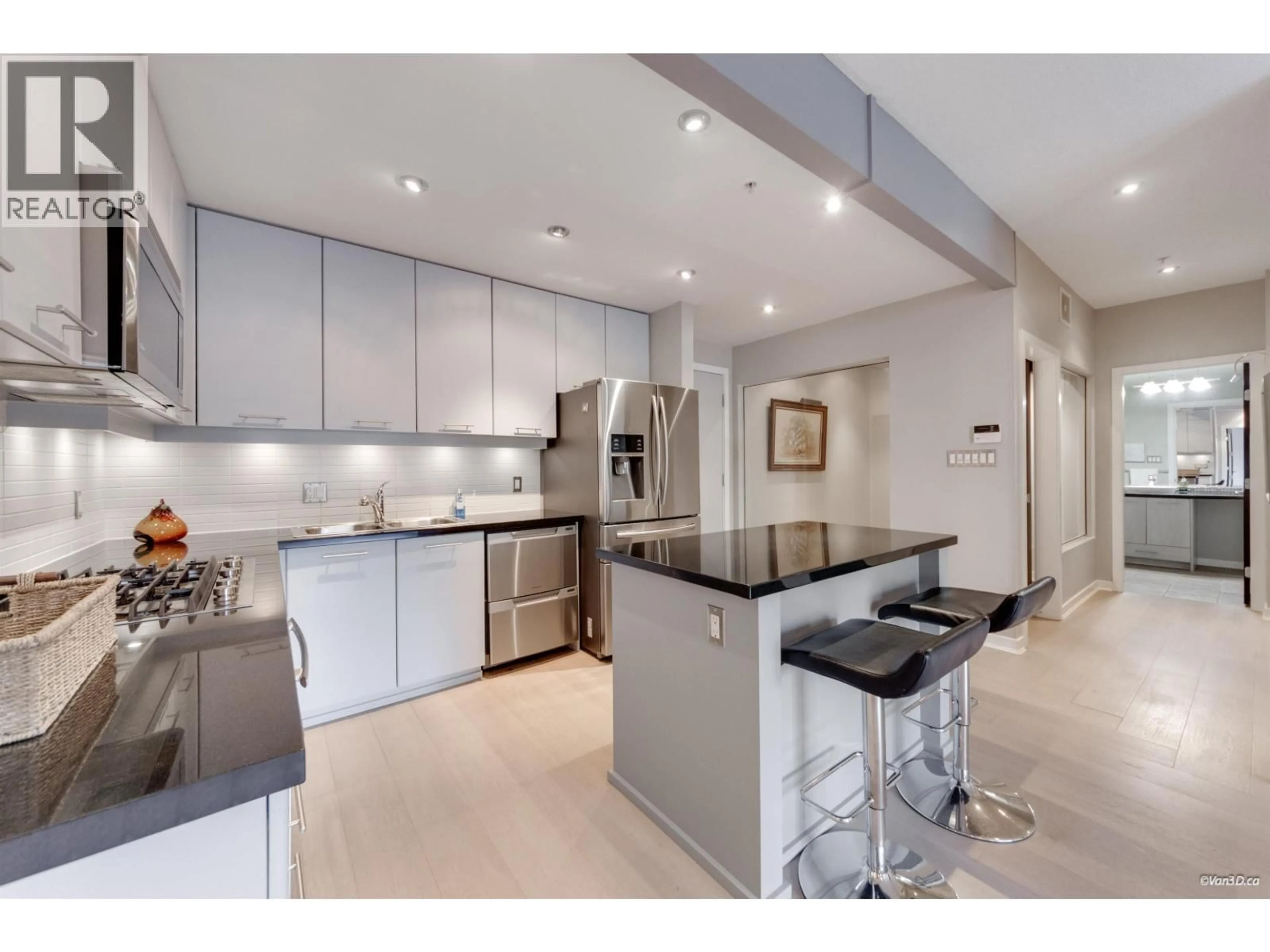 Contemporary kitchen, ceramic/tile floor for 210 - 530 RAVEN WOODS DRIVE, North Vancouver British Columbia V7G2T5