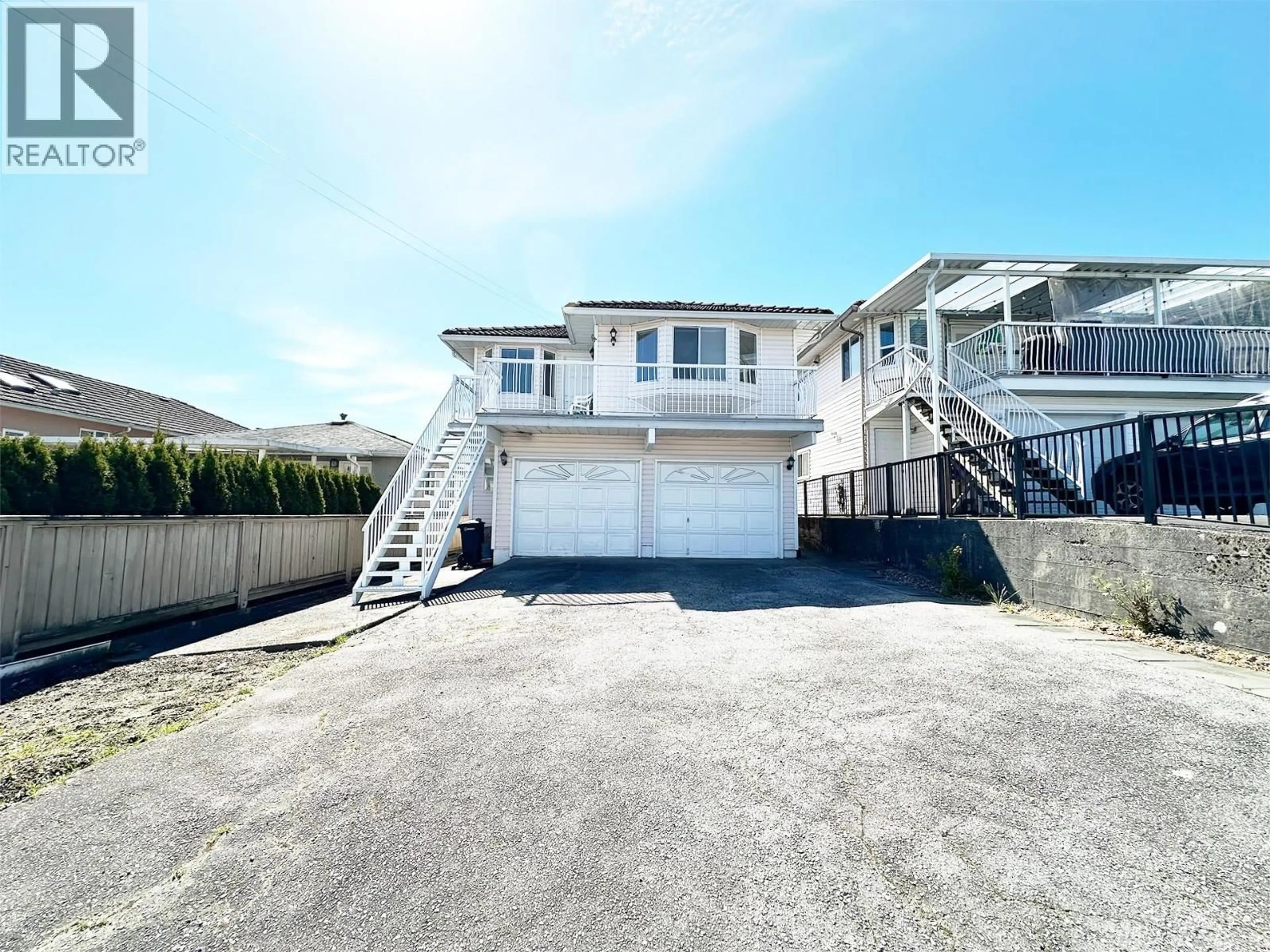 A pic from outside/outdoor area/front of a property/back of a property/a pic from drone, street for 7674 HILDA STREET, Burnaby British Columbia V3N3H7