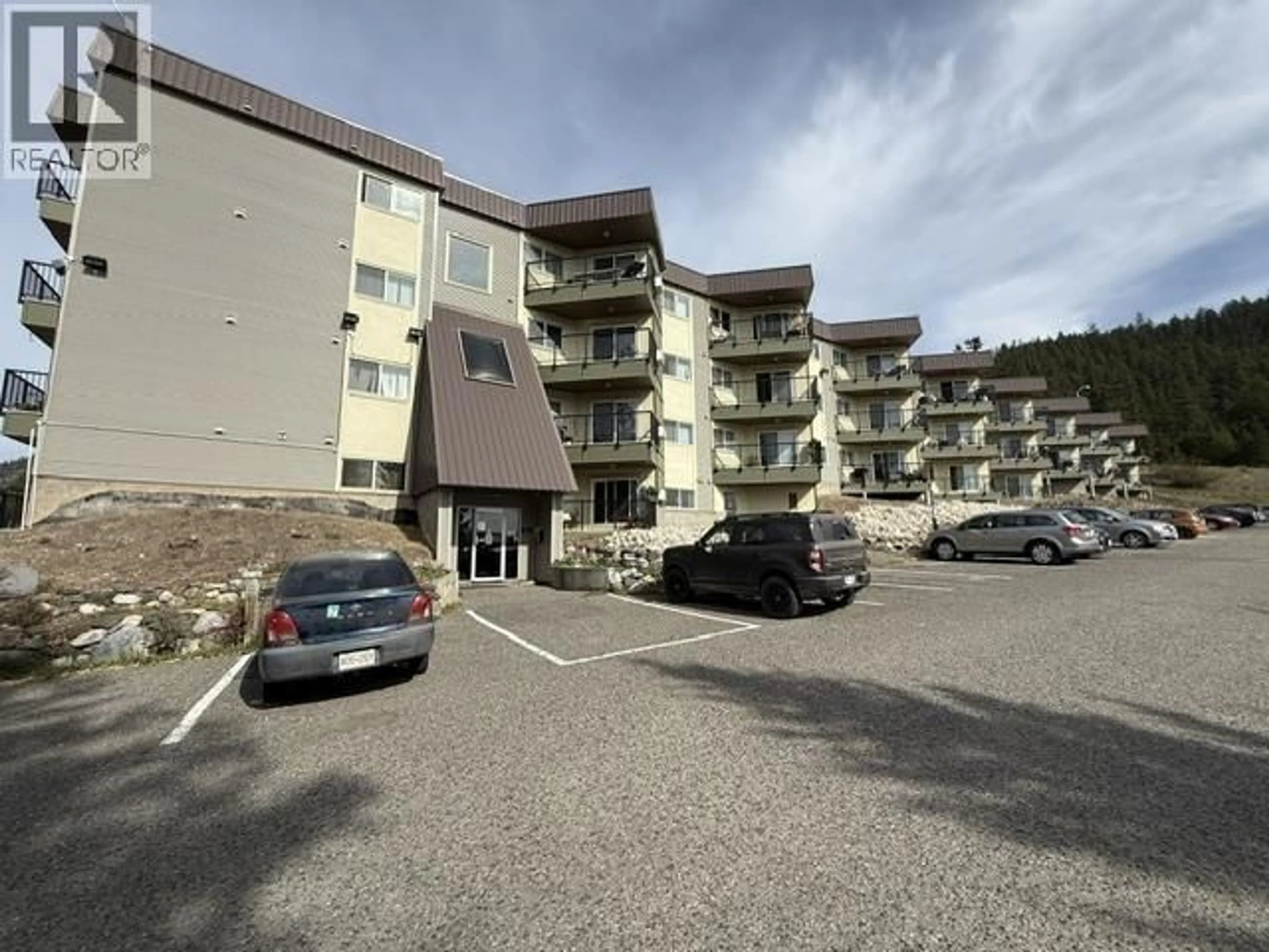 A pic from outside/outdoor area/front of a property/back of a property/a pic from drone, mountain view for 101 - 282 BROADWAY AVENUE, Williams Lake British Columbia V2G4J8