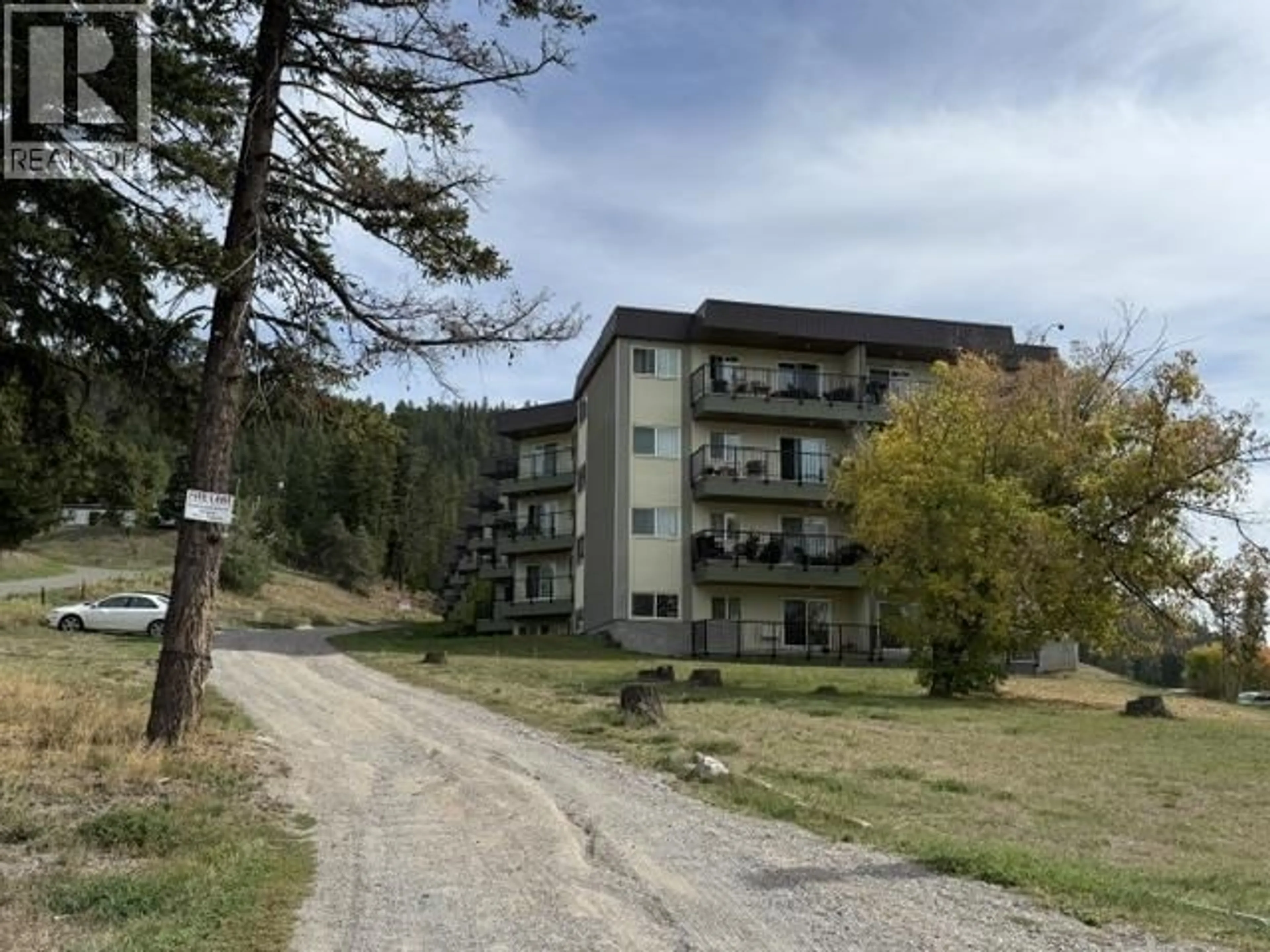 A pic from outside/outdoor area/front of a property/back of a property/a pic from drone, mountain view for 101 - 282 BROADWAY AVENUE, Williams Lake British Columbia V2G4J8