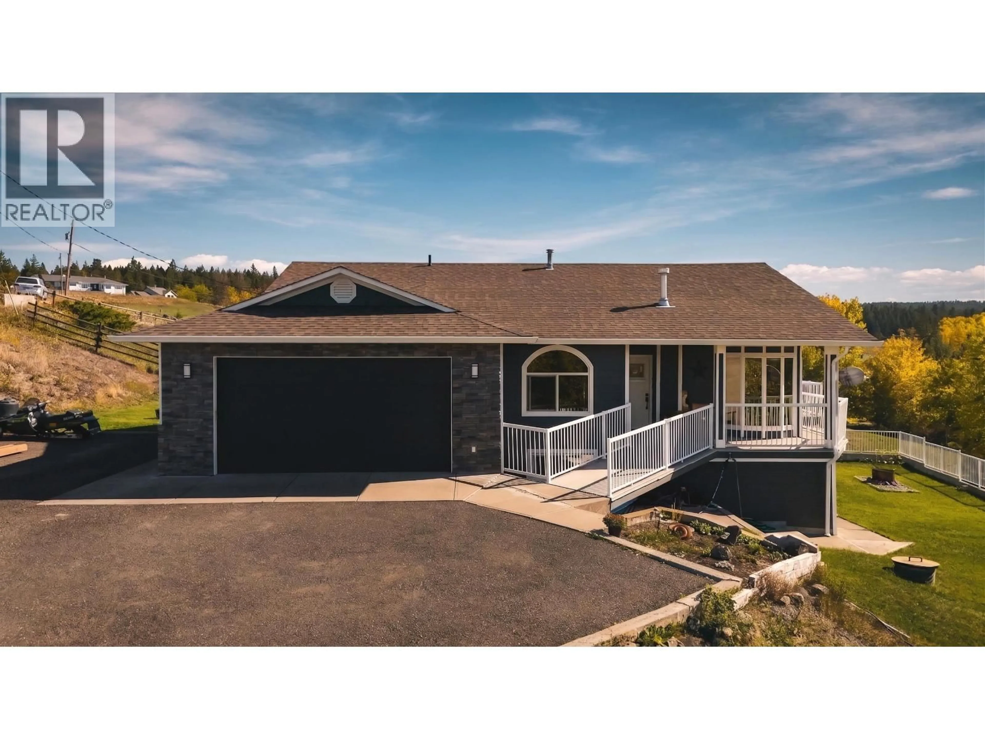 Home with vinyl exterior material, street for 3152 HUSTON ROAD, 150 Mile House British Columbia V0K2G0