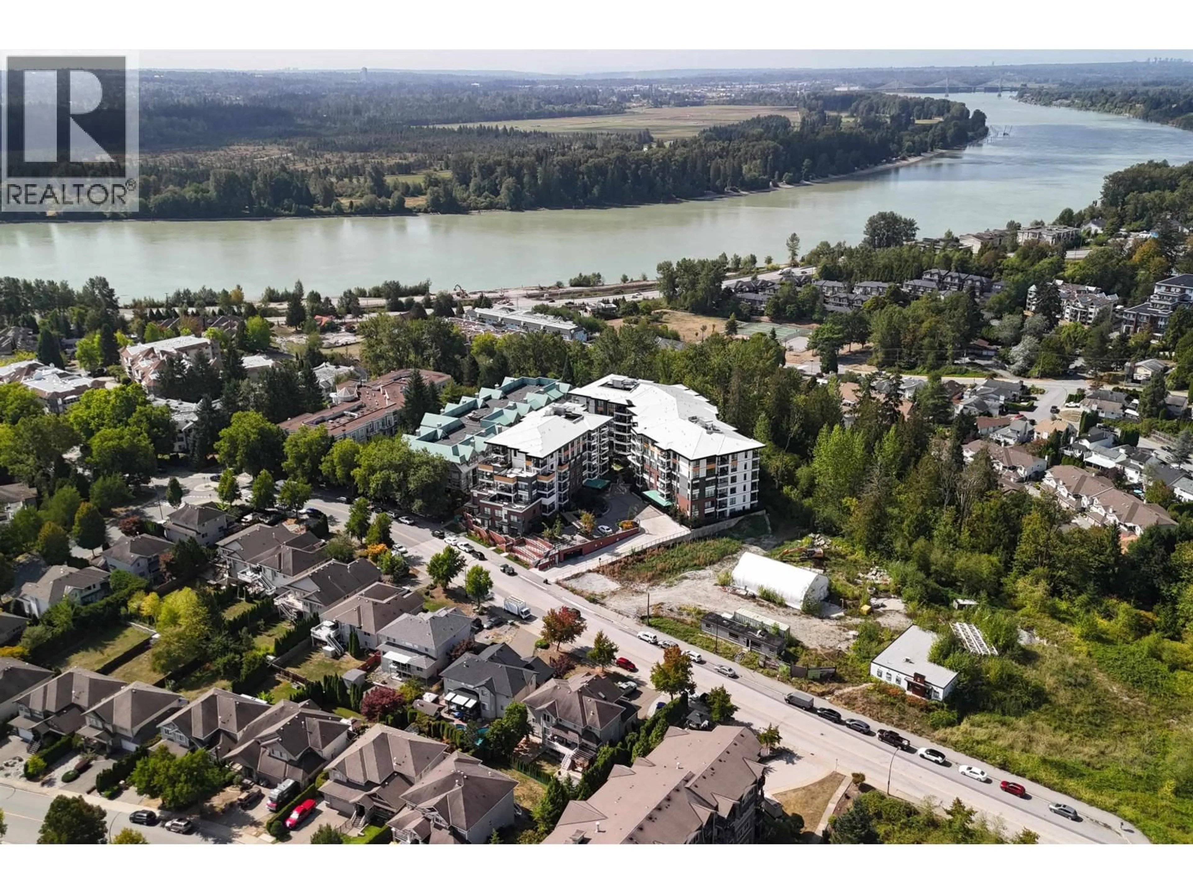 A pic from outside/outdoor area/front of a property/back of a property/a pic from drone, water/lake/river/ocean view for 108 - 11639 227 STREET, Maple Ridge British Columbia V2X9B2