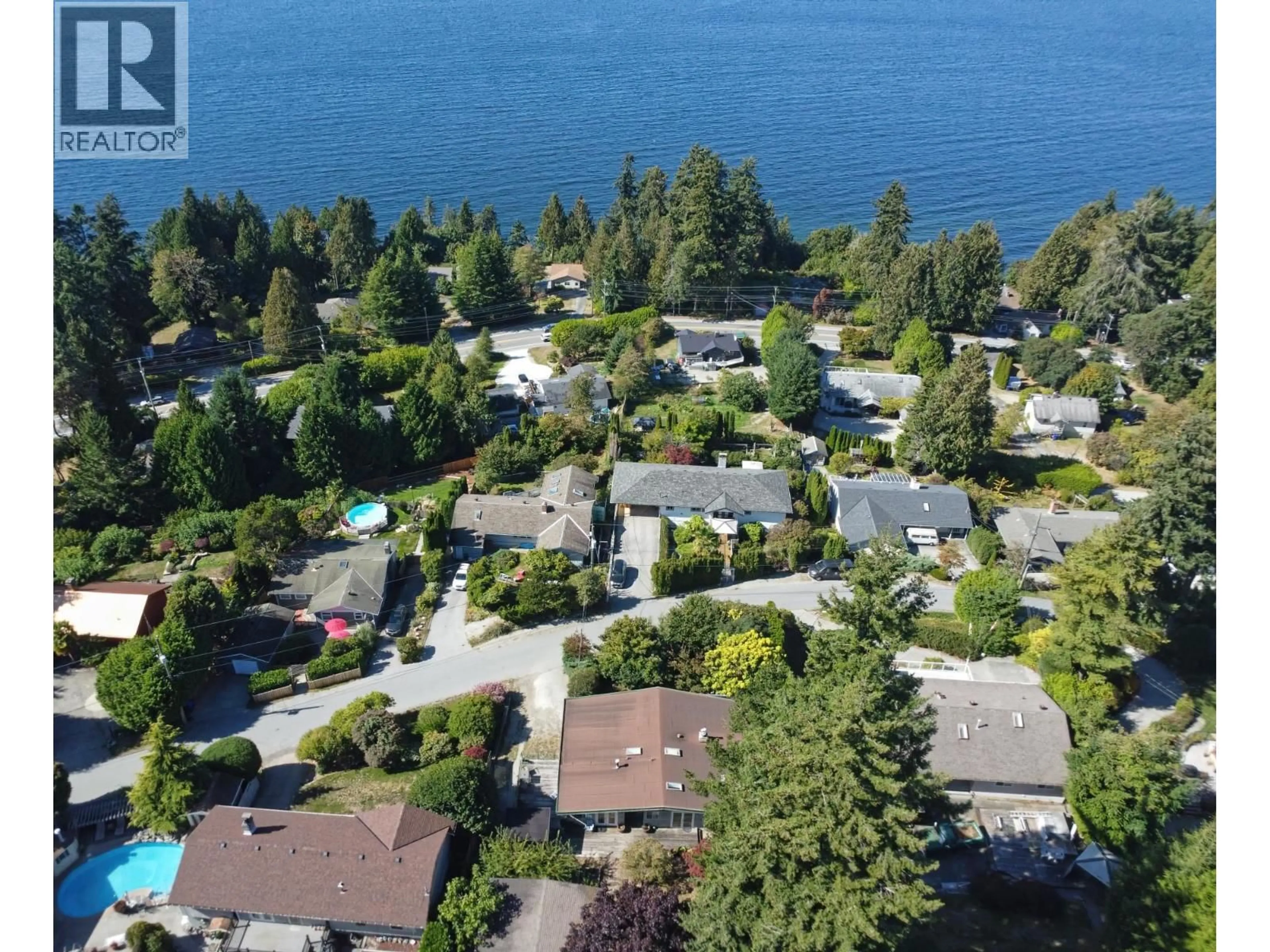 A pic from outside/outdoor area/front of a property/back of a property/a pic from drone, water/lake/river/ocean view for 5134 RADCLIFFE ROAD, Sechelt British Columbia V7Z0G5