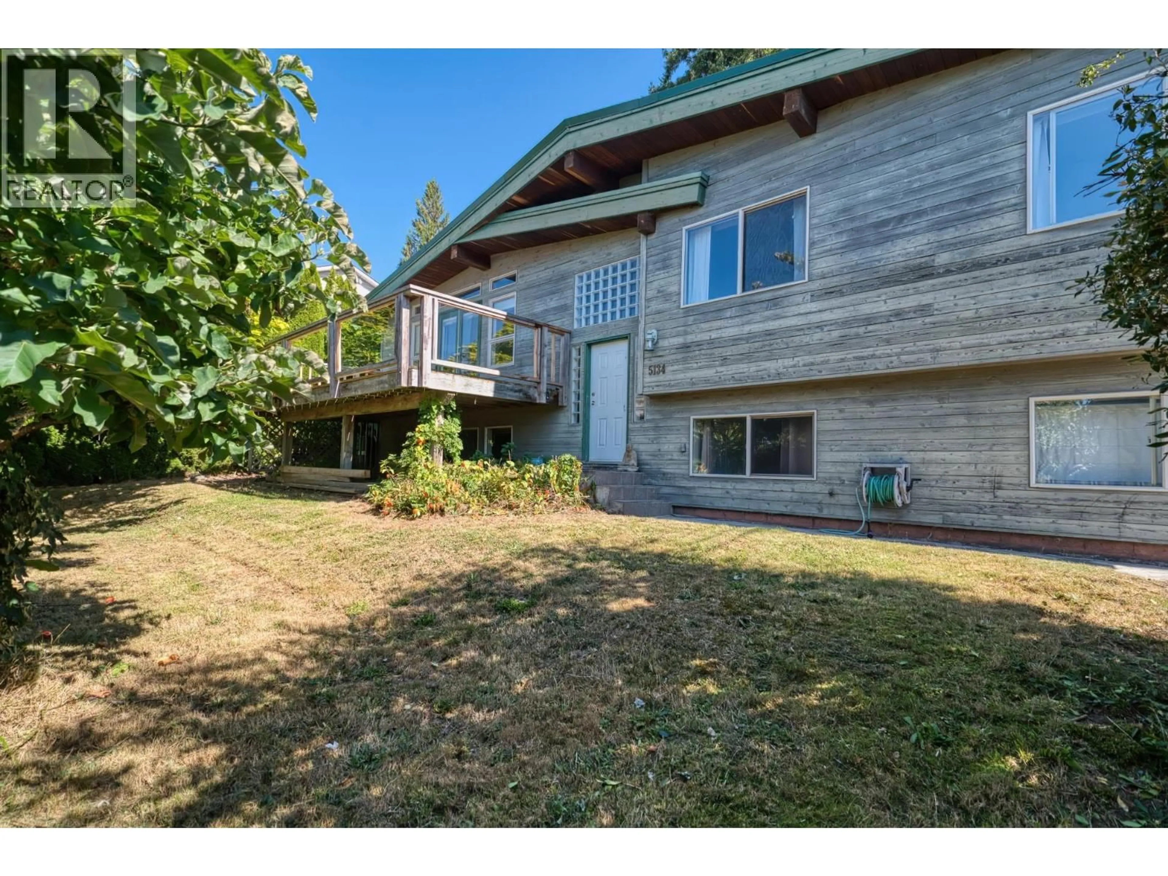 A pic from outside/outdoor area/front of a property/back of a property/a pic from drone, unknown for 5134 RADCLIFFE ROAD, Sechelt British Columbia V7Z0G5