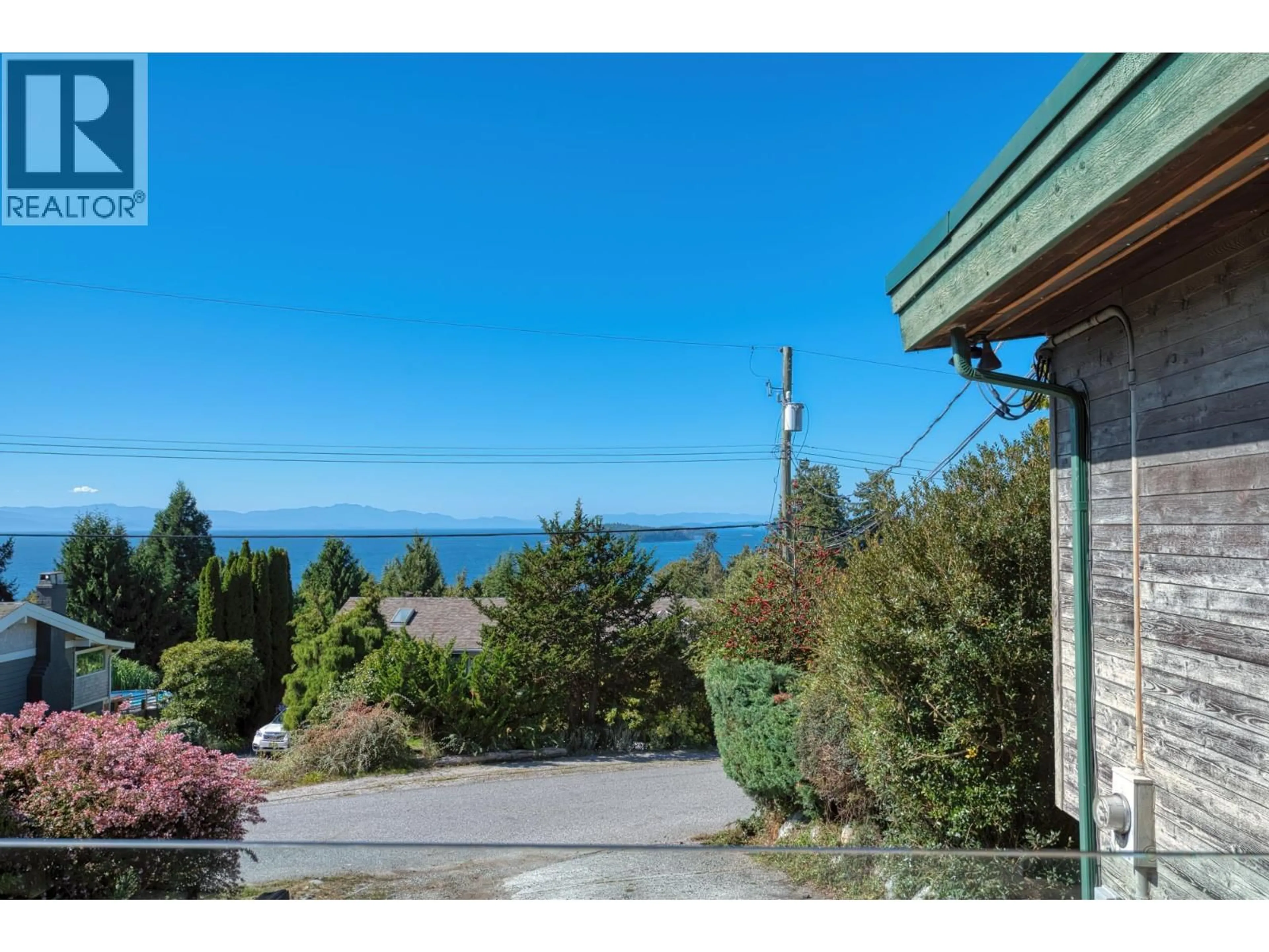 A pic from outside/outdoor area/front of a property/back of a property/a pic from drone, water/lake/river/ocean view for 5134 RADCLIFFE ROAD, Sechelt British Columbia V7Z0G5