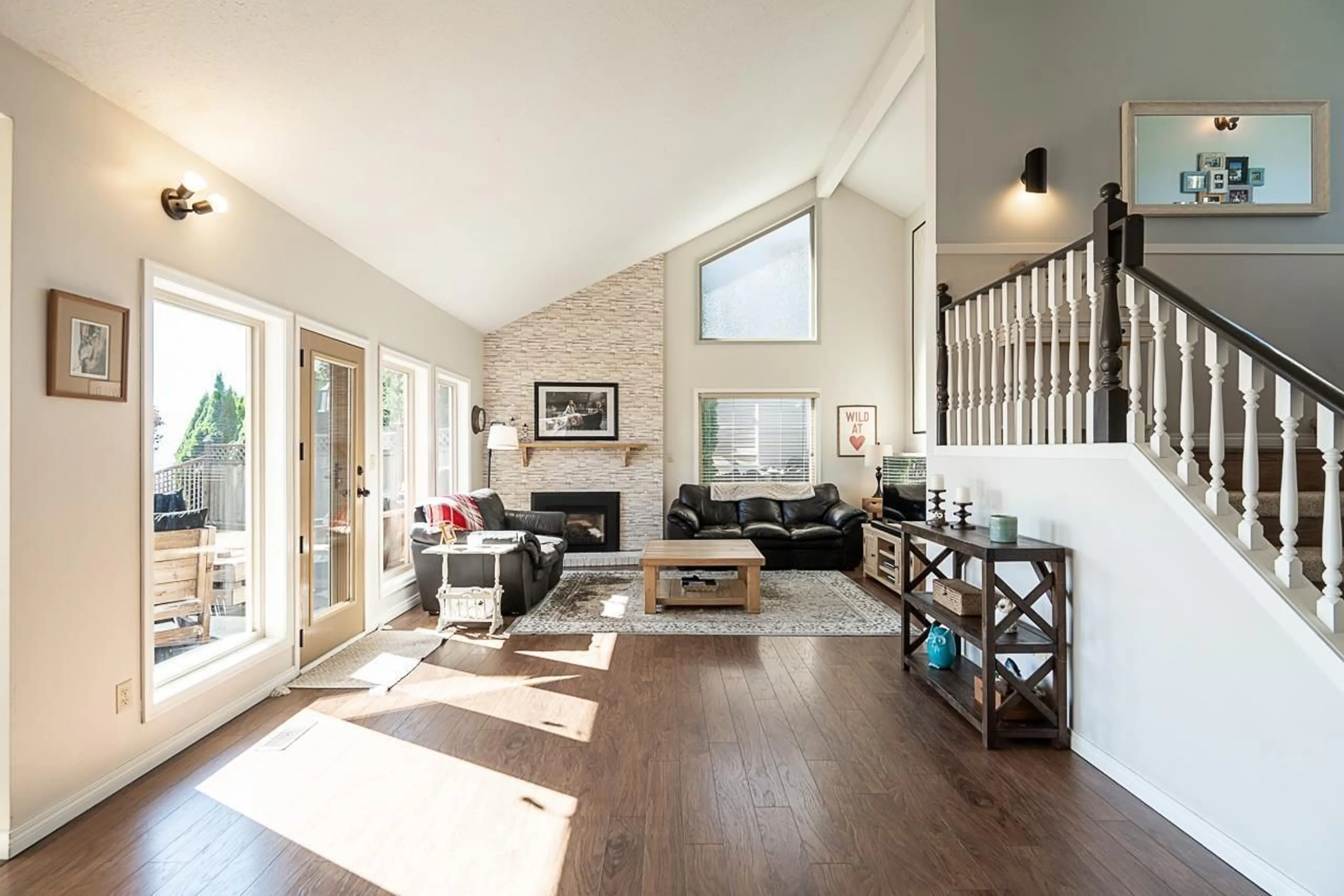 Living room with furniture, wood/laminate floor for 35950 EAGLECREST PLACE, Abbotsford British Columbia V3G1E7