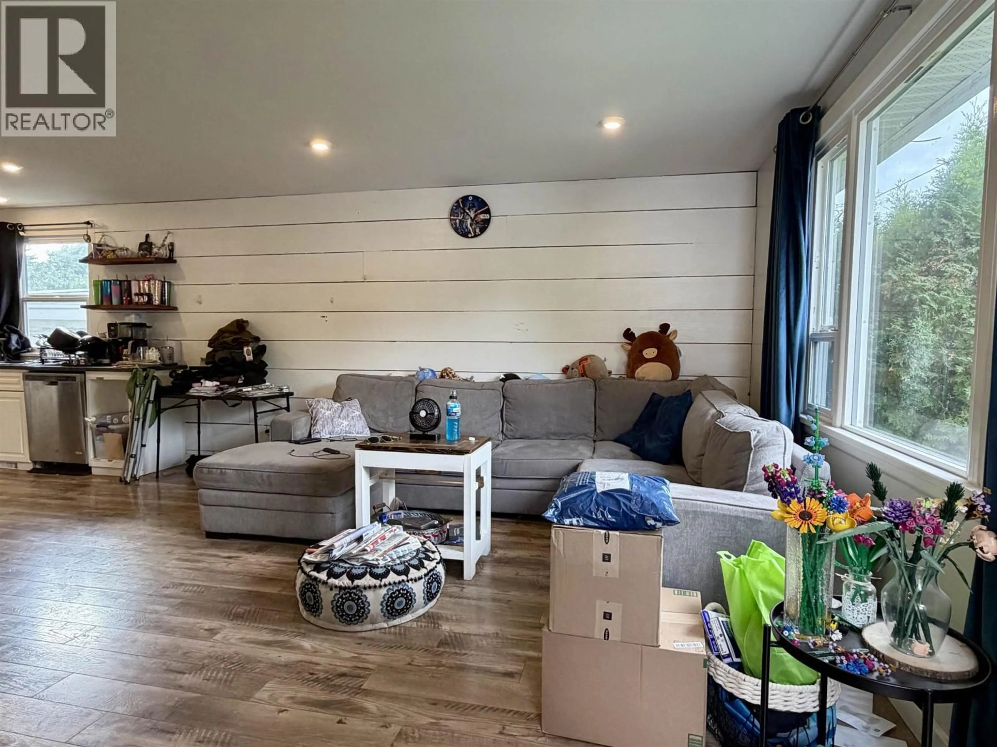 Living room with furniture, wood/laminate floor for 4735 SOUCIE AVENUE, Terrace British Columbia V8G2E9