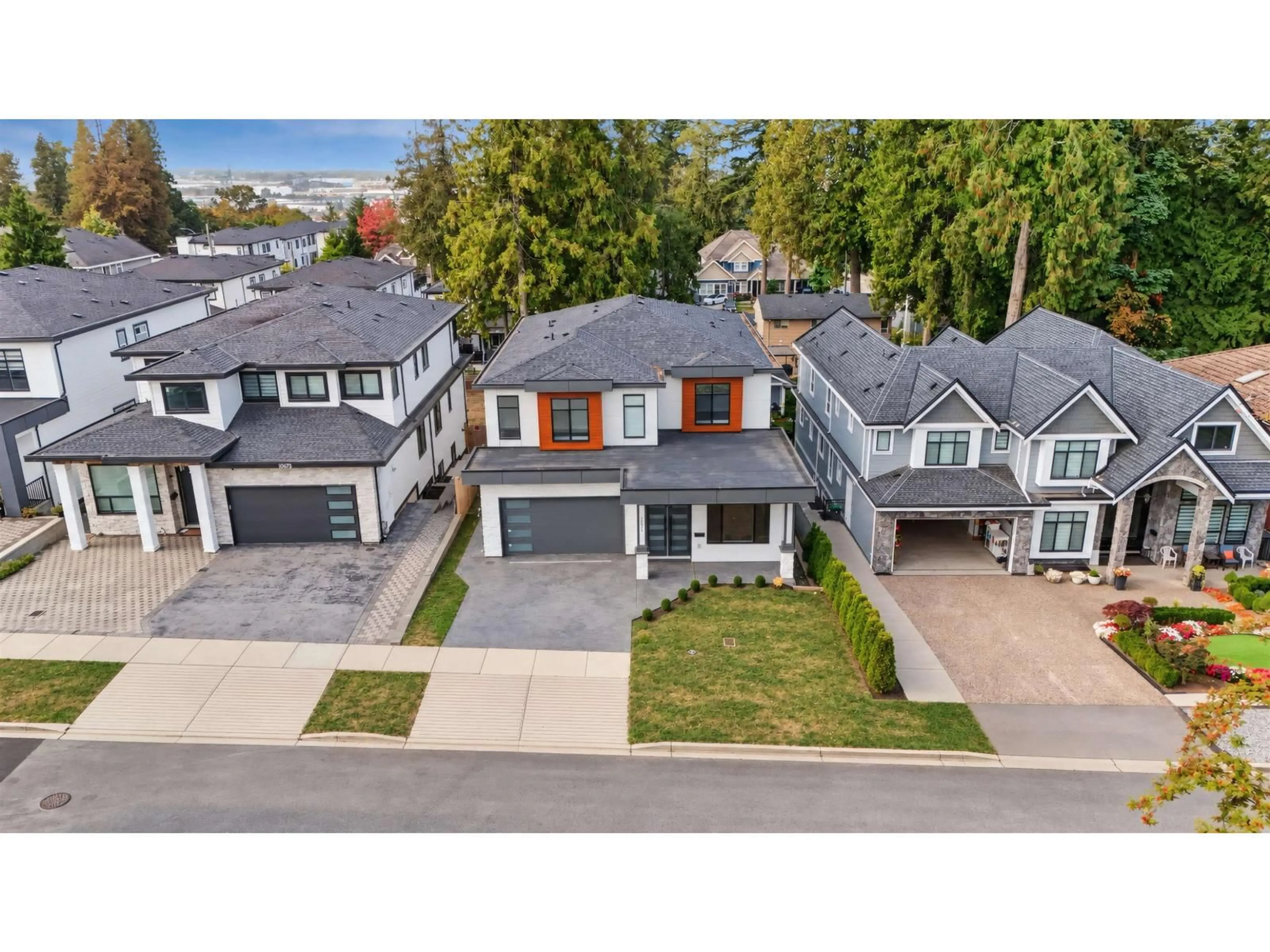 A pic from outside/outdoor area/front of a property/back of a property/a pic from drone, street for 10671 127A STREET, Surrey British Columbia V3V5L7