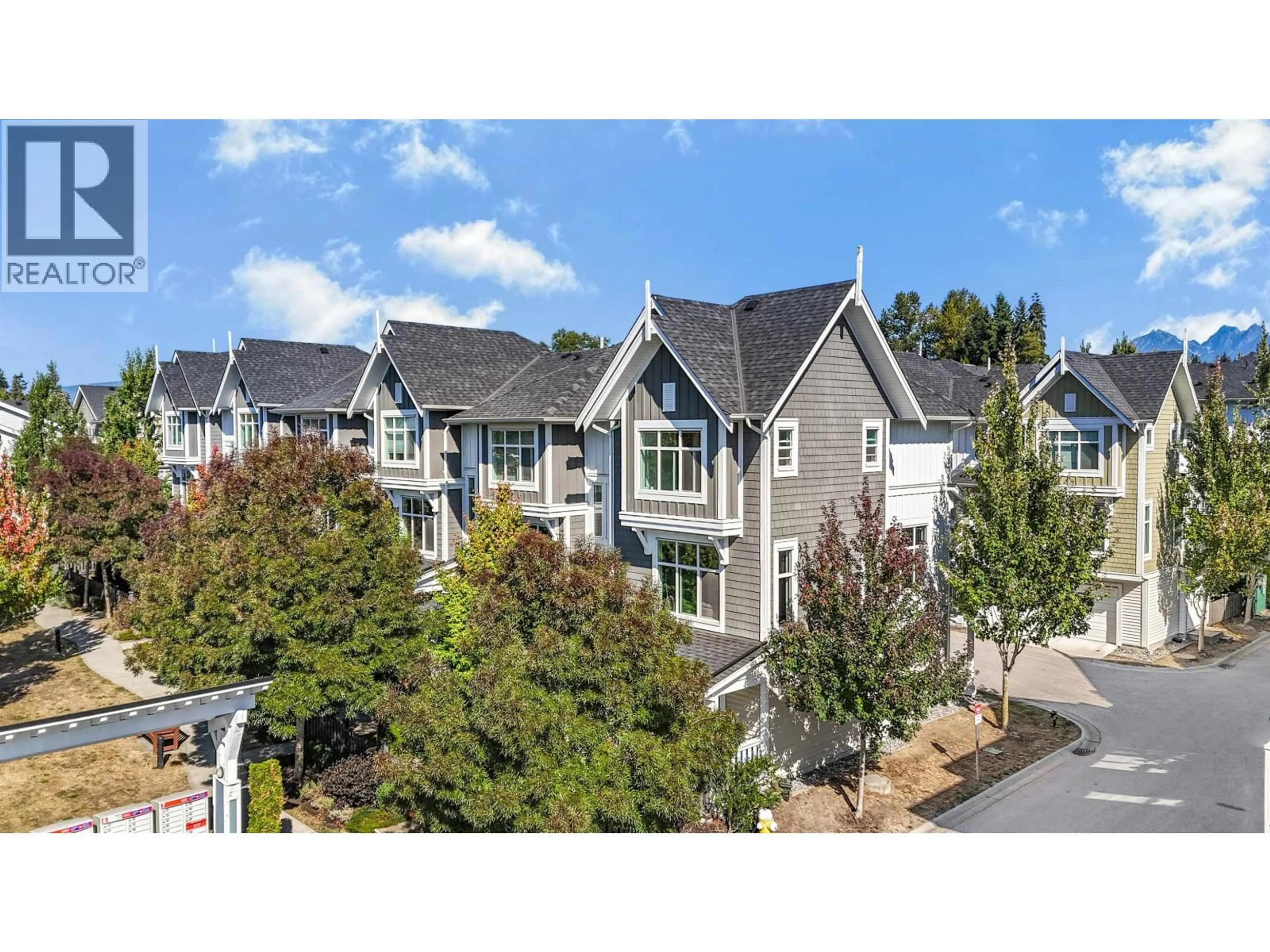 A pic from outside/outdoor area/front of a property/back of a property/a pic from drone, mountain view for 1301 - 11295 PAZARENA PLACE, Maple Ridge British Columbia V2X4K9