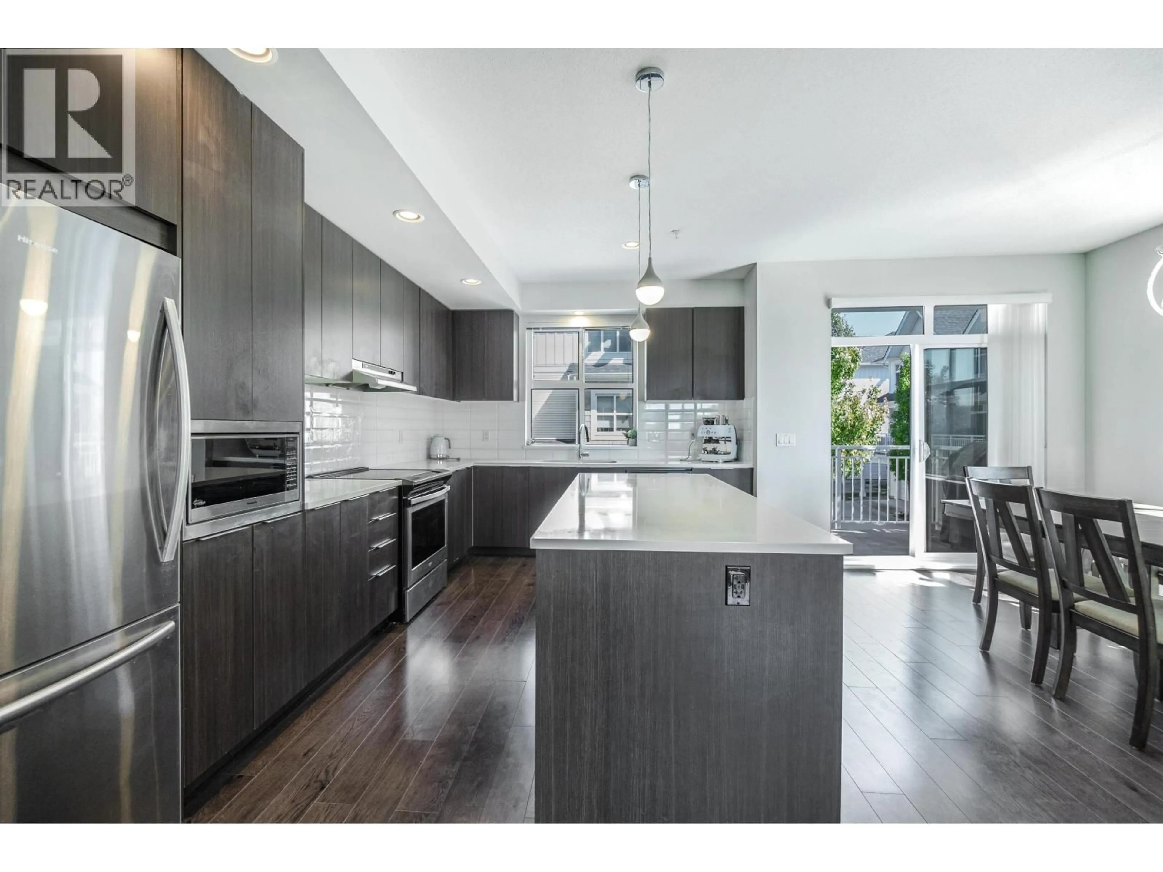 Contemporary kitchen, unknown for 1301 - 11295 PAZARENA PLACE, Maple Ridge British Columbia V2X4K9