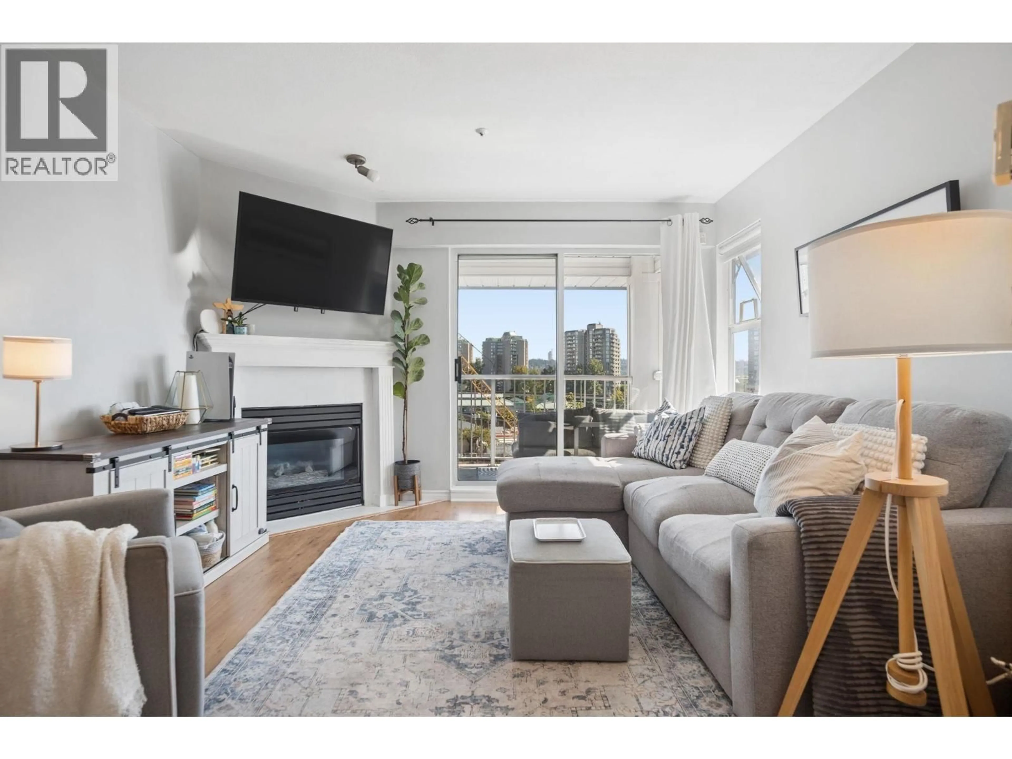 Living room with furniture, wood/laminate floor for 507 - 135 ELEVENTH STREET, New Westminster British Columbia V3M4C7