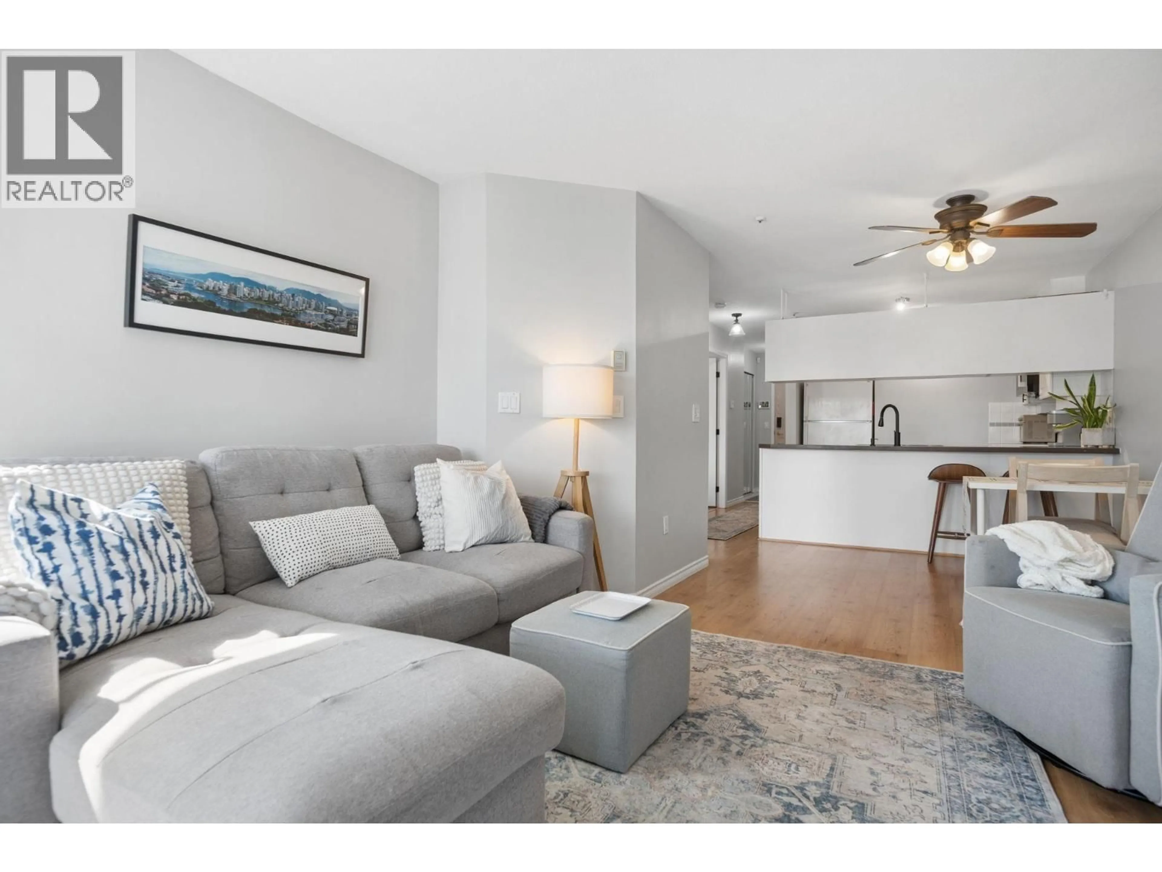 Living room with furniture, wood/laminate floor for 507 - 135 ELEVENTH STREET, New Westminster British Columbia V3M4C7