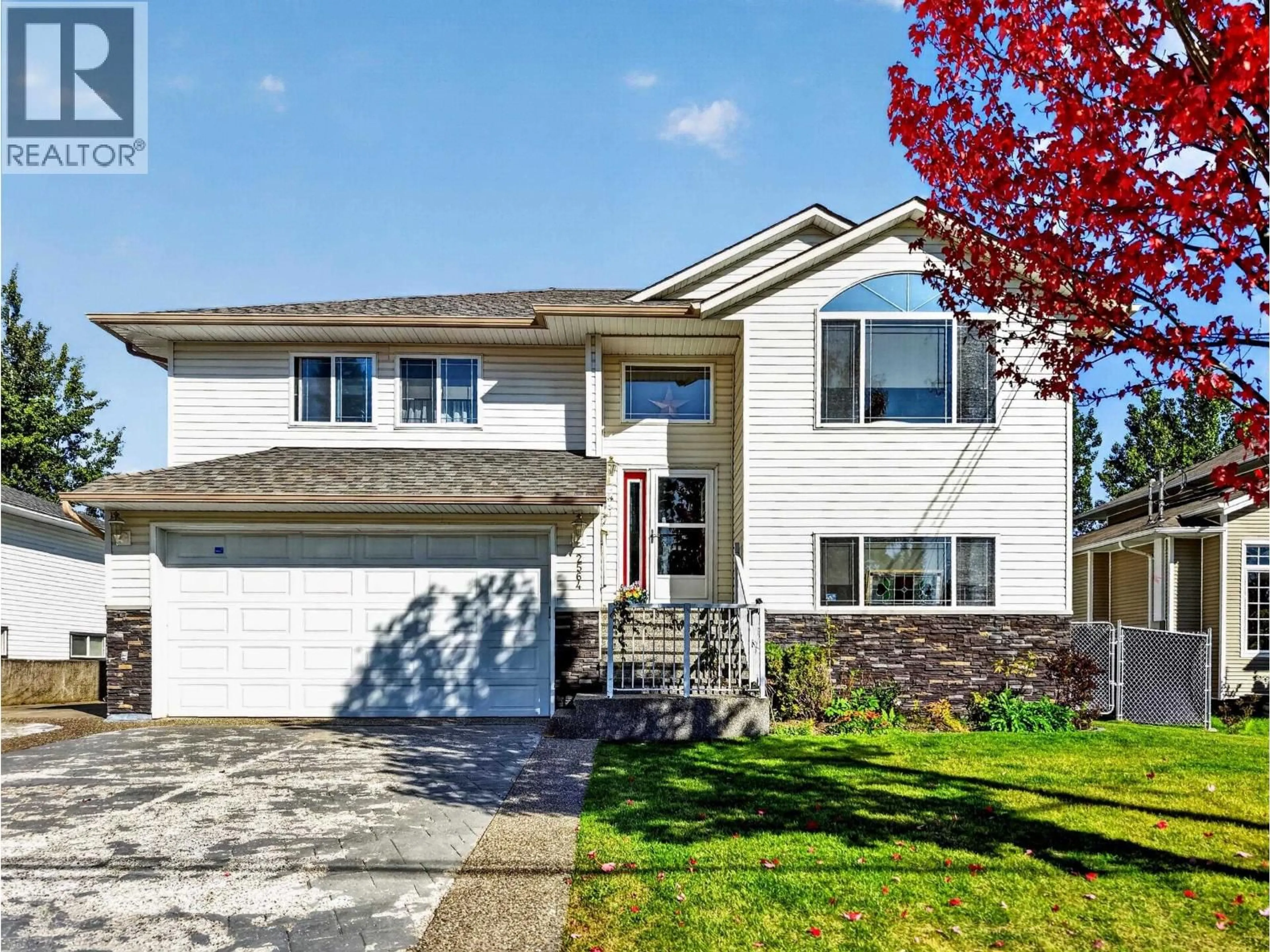 Home with vinyl exterior material, street for 2564 BERNARD ROAD, Prince George British Columbia V2N5M1