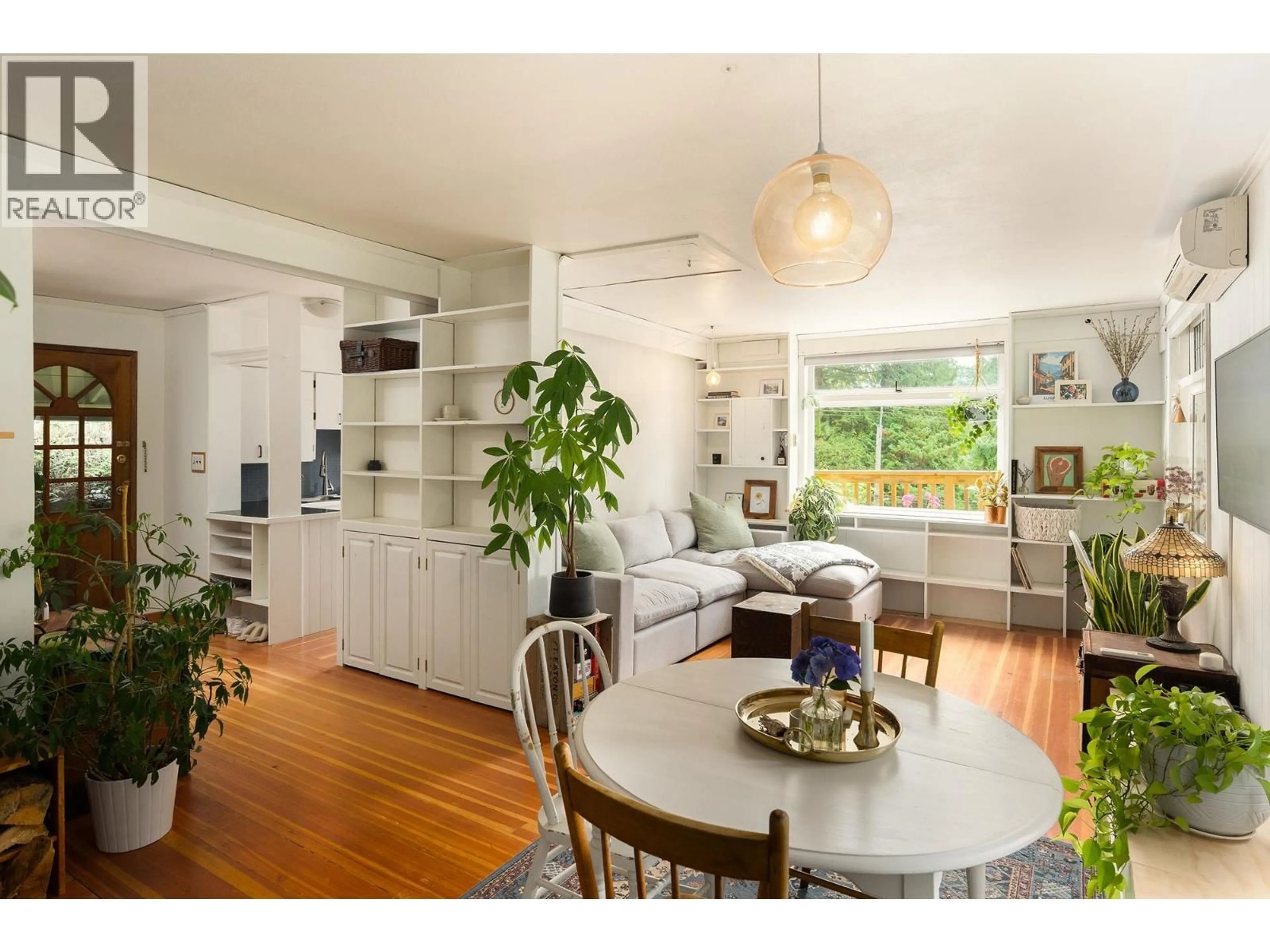 Open concept kitchen, wood/laminate floor for 1144 MILLER ROAD, Bowen Island British Columbia V0N1G1