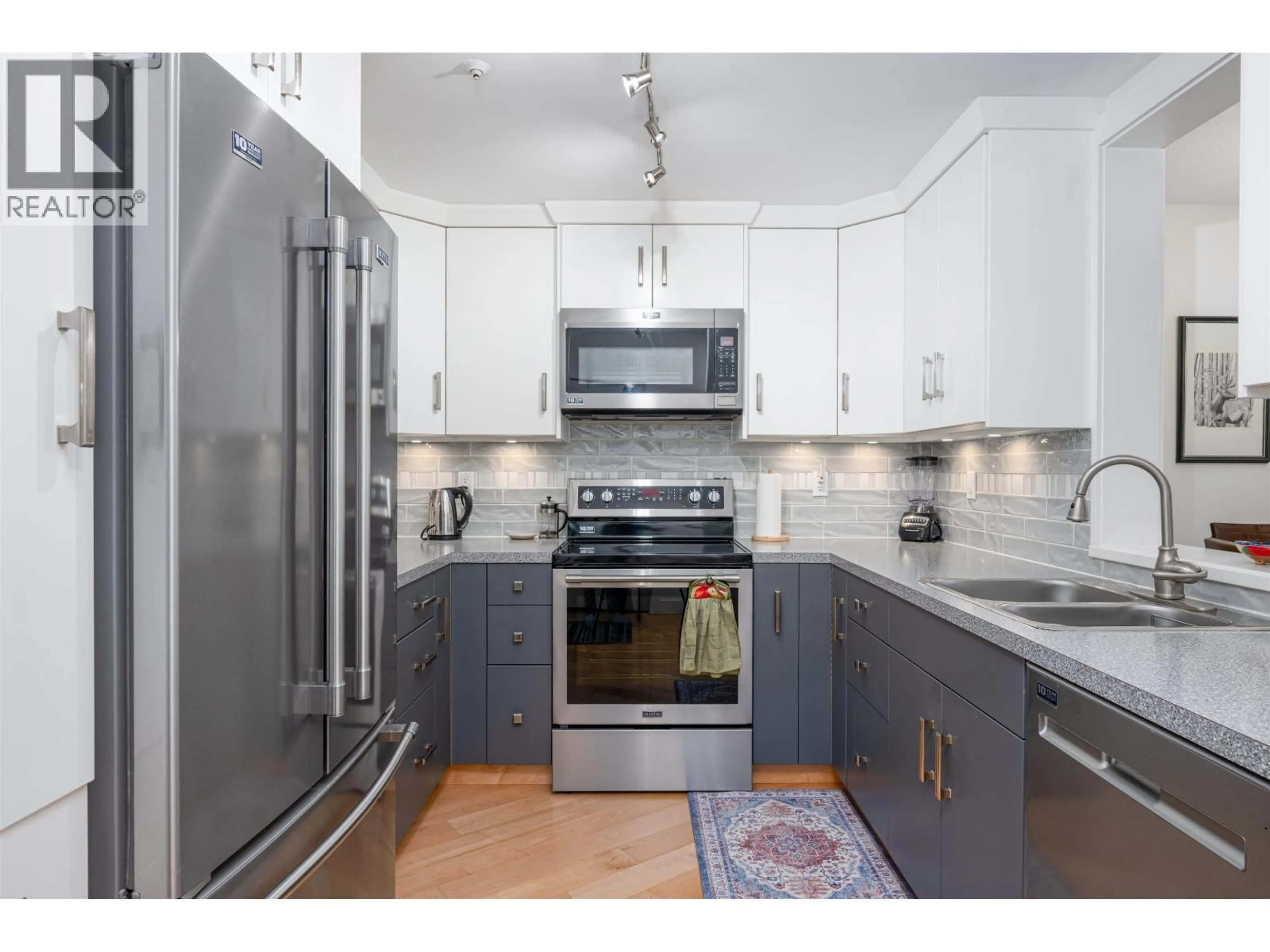 Open concept kitchen, unknown for 104 - 1638 6TH AVENUE, Prince George British Columbia V2L3N6