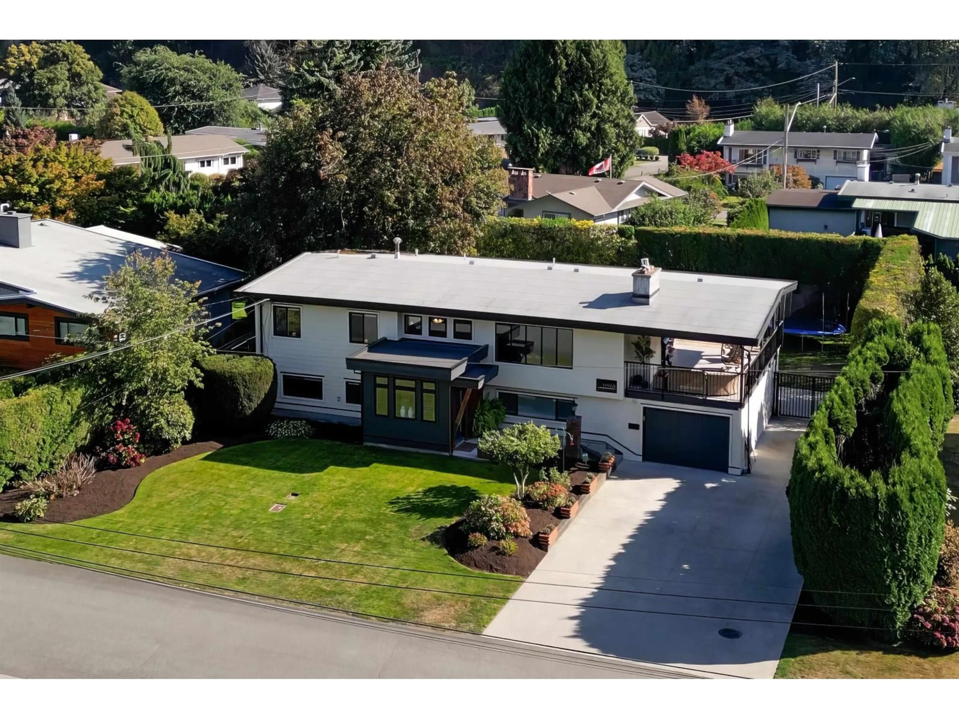 A pic from outside/outdoor area/front of a property/back of a property/a pic from drone, street for 10165 BRENTWOOD DRIVE, Chilliwack British Columbia V2P6G5