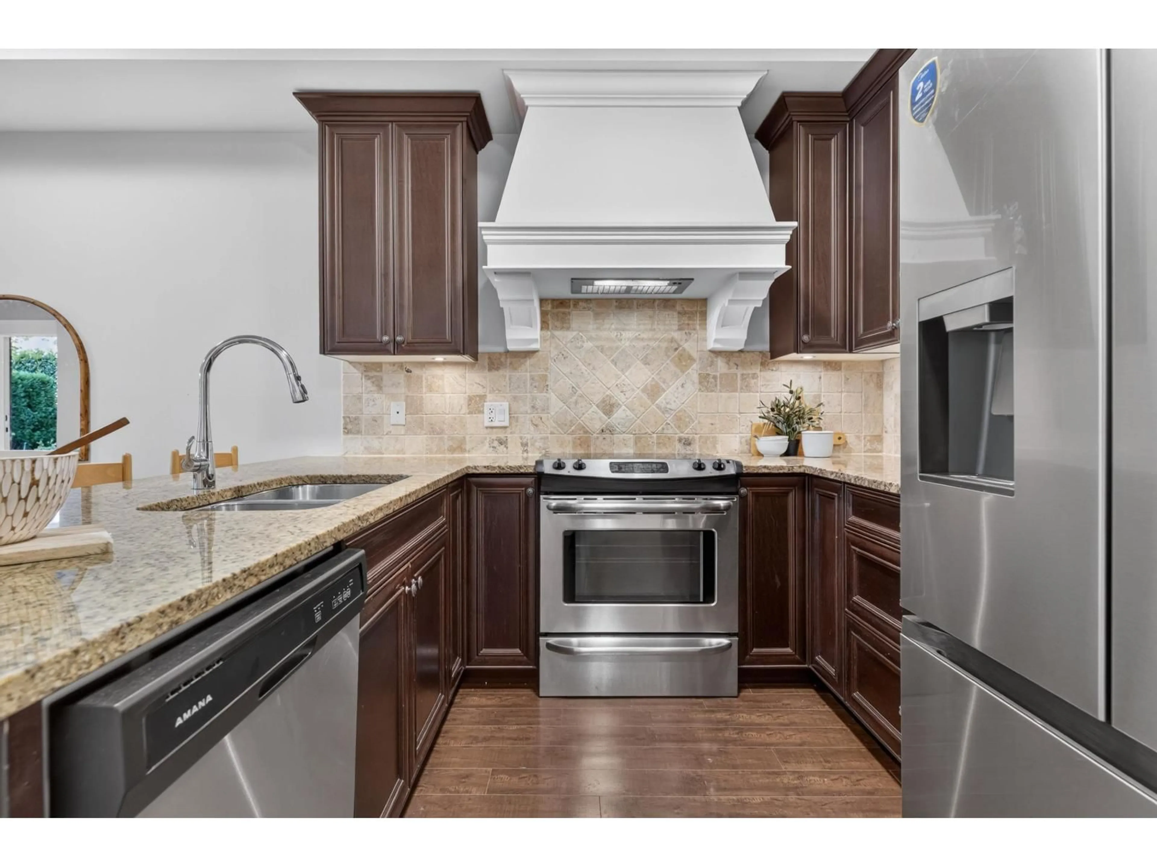 Open concept kitchen, ceramic/tile floor for 107 - 19530 65 AVENUE, Surrey British Columbia V4N6M1