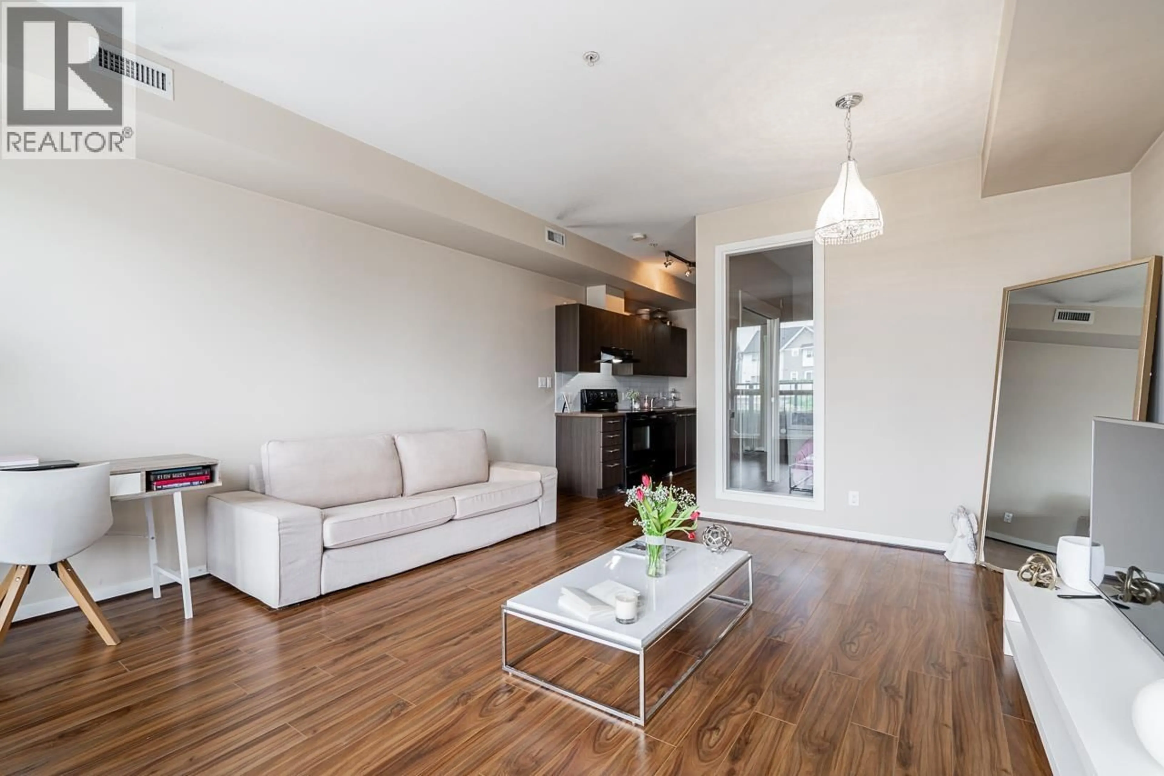 Living room with furniture, wood/laminate floor for 161 - 4099 STOLBERG STREET, Richmond British Columbia V6X0J4