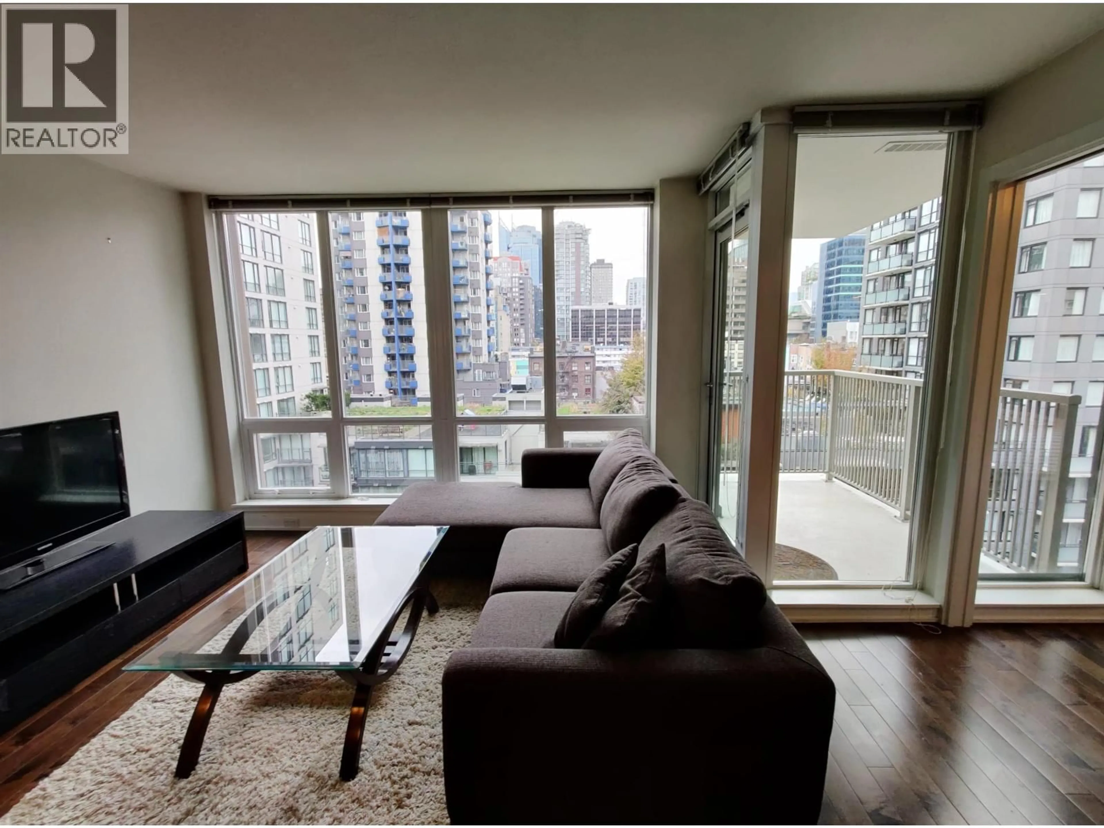 Living room with furniture, wood/laminate floor for 1002 - 1055 RICHARDS STREET, Vancouver British Columbia V6B0C2