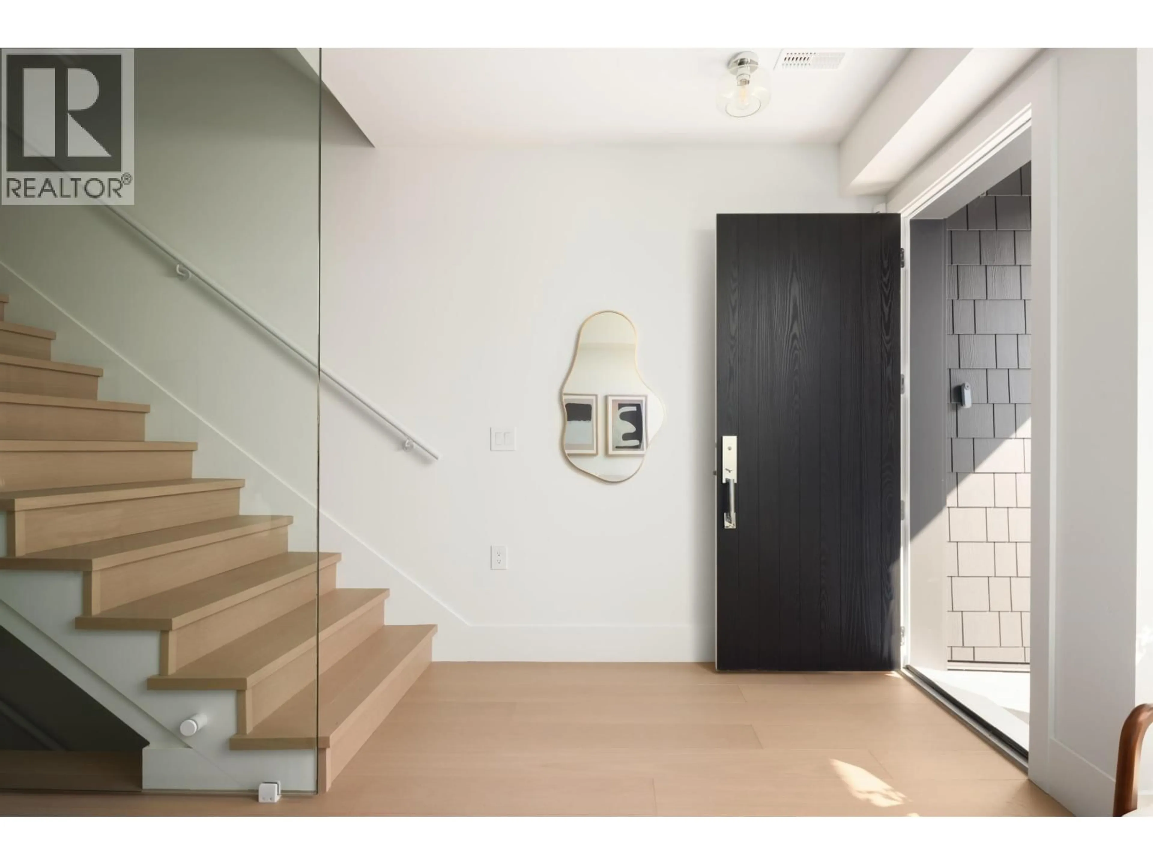 Indoor foyer for 103 - 1837 GEORGIA STREET, Vancouver British Columbia V5L2B5