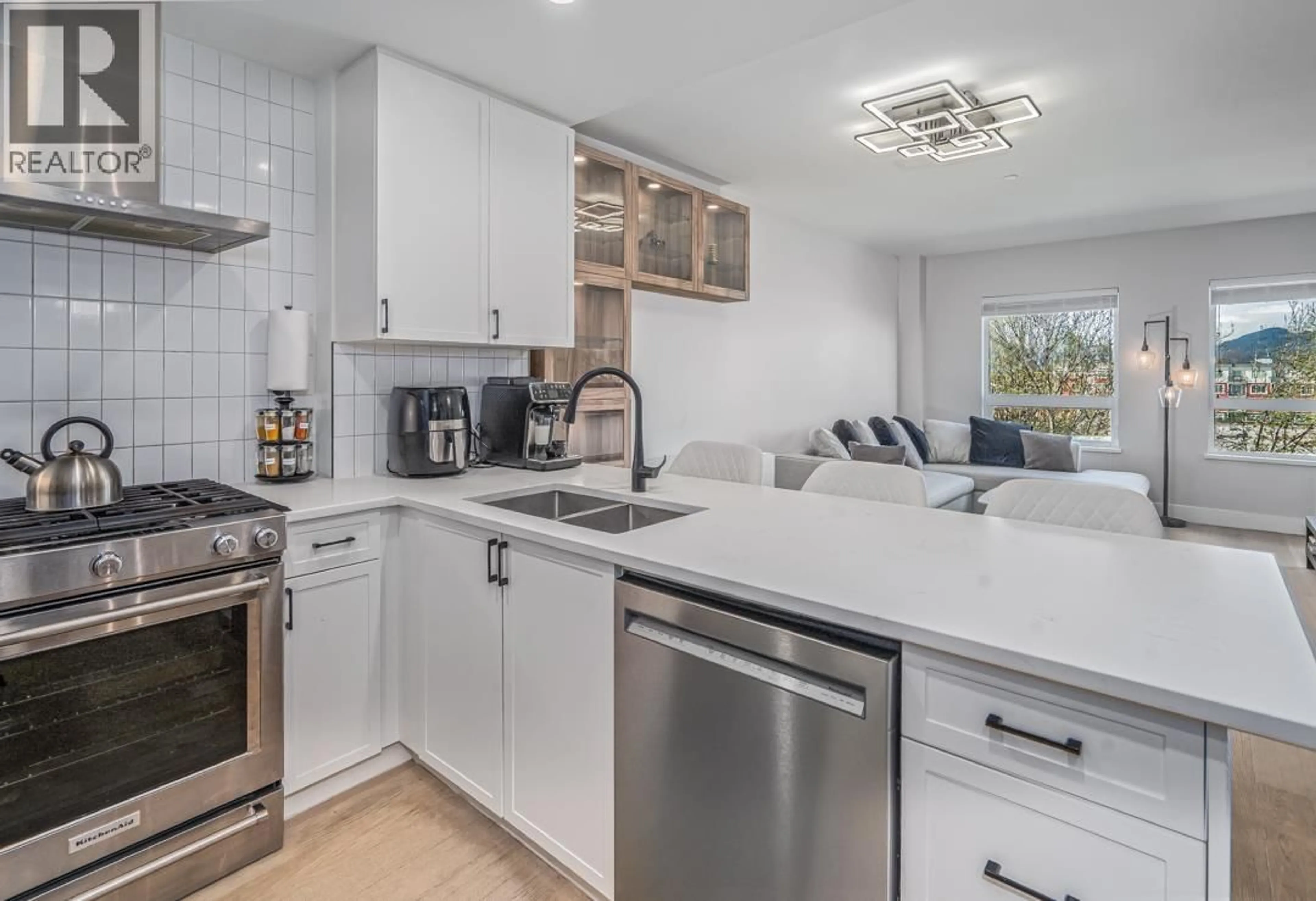 Open concept kitchen, ceramic/tile floor for 303 - 22226 BROWN AVENUE, Maple Ridge British Columbia V2X4R2