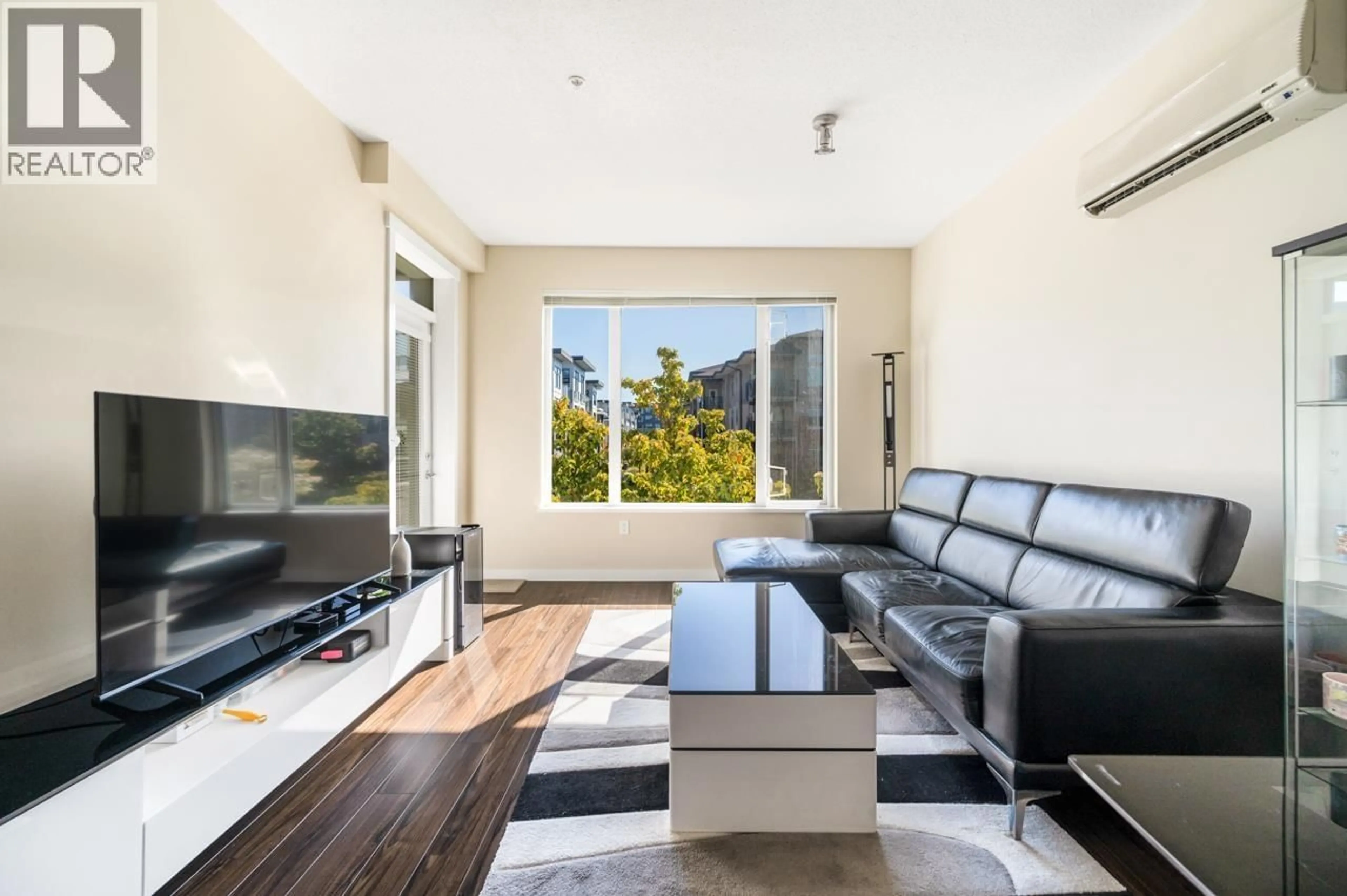 Living room with furniture, unknown for 237 - 9399 ODLIN ROAD, Richmond British Columbia V6X0J6