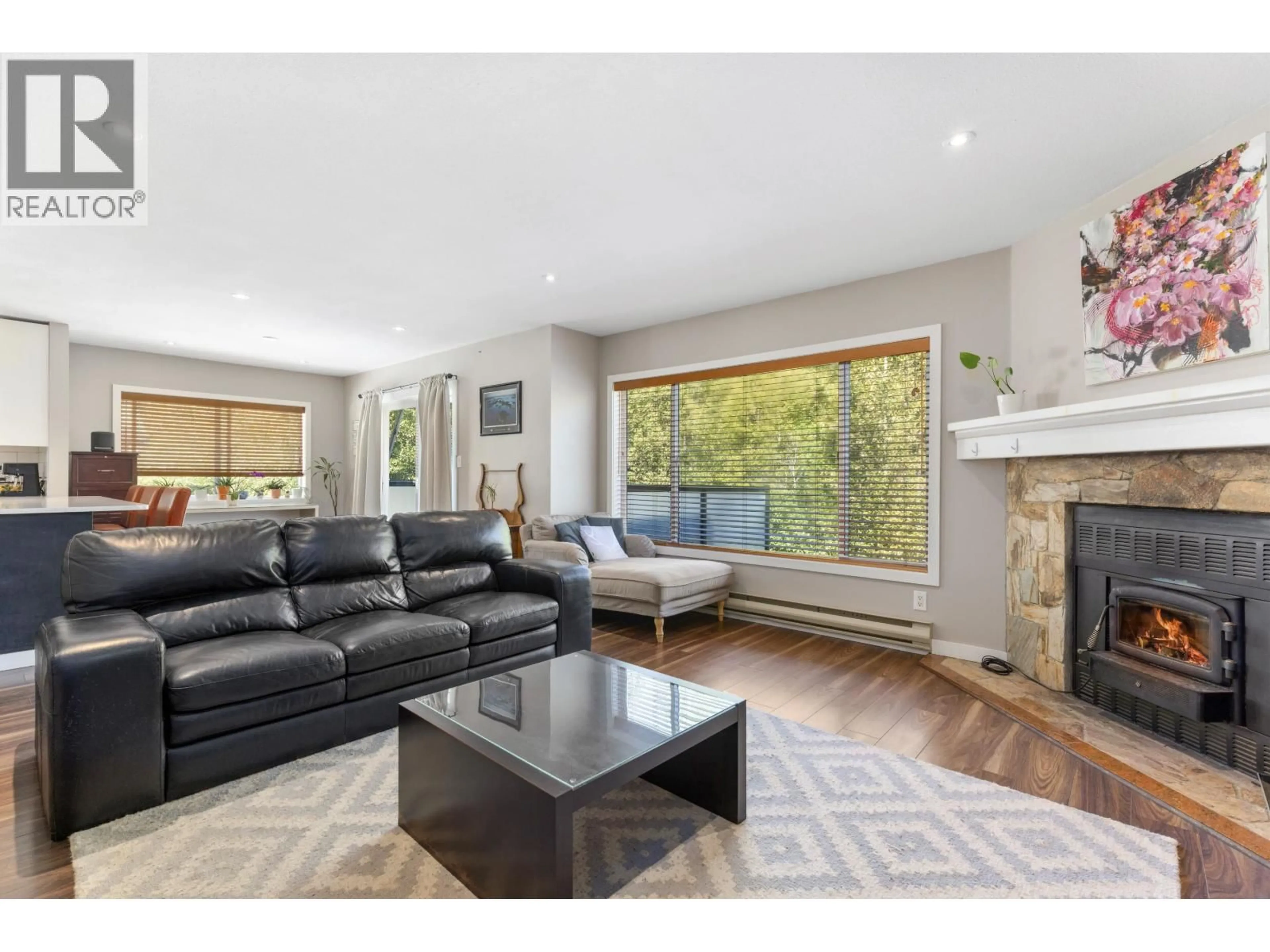 Living room with furniture, wood/laminate floor for 6 - 7467 PROSPECT STREET, Pemberton British Columbia V0N2L1
