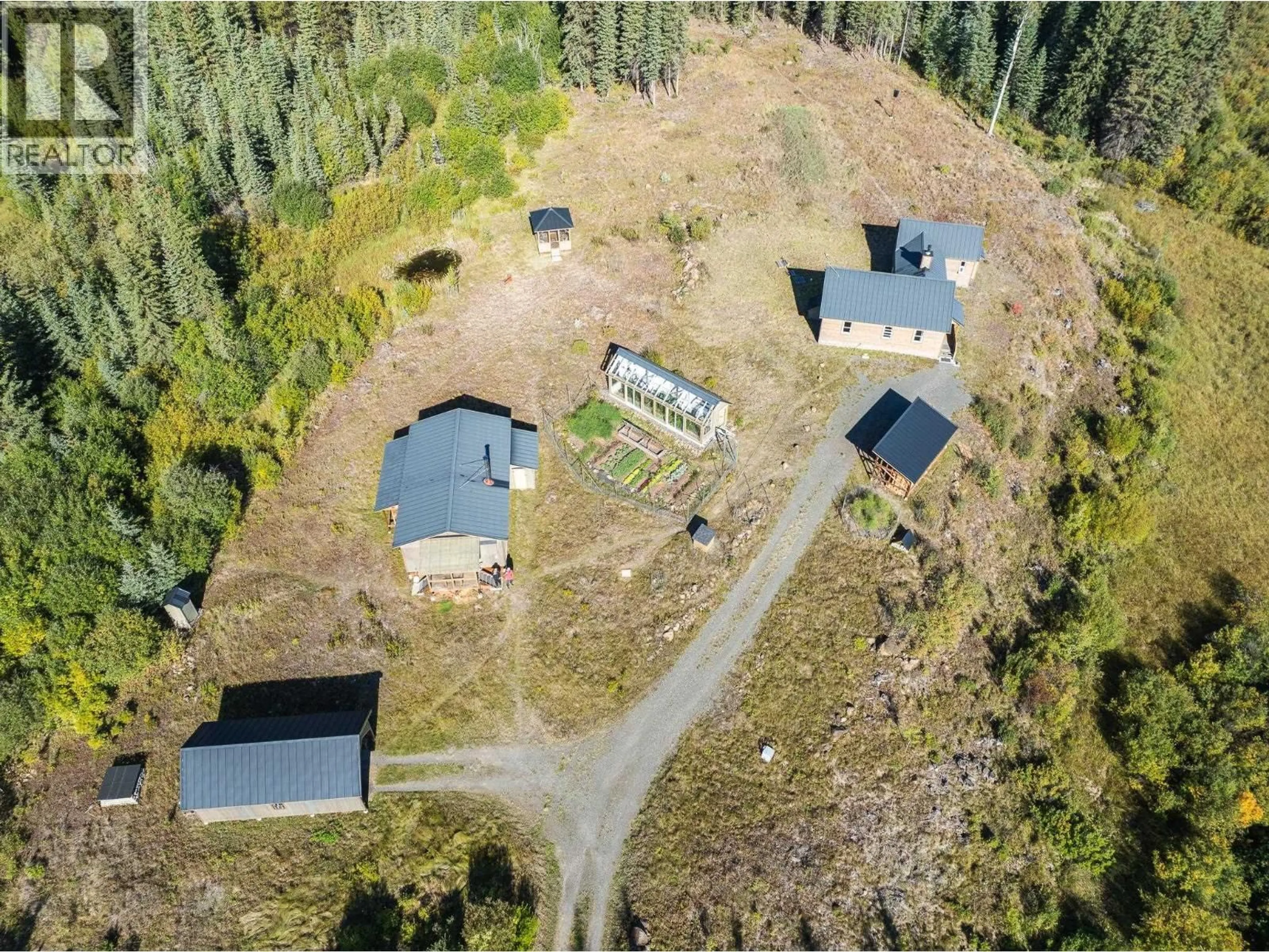 A pic from outside/outdoor area/front of a property/back of a property/a pic from drone, forest/trees view for 7568 HIGH COUNTRY ROAD, Bridge Lake British Columbia V0K1X2